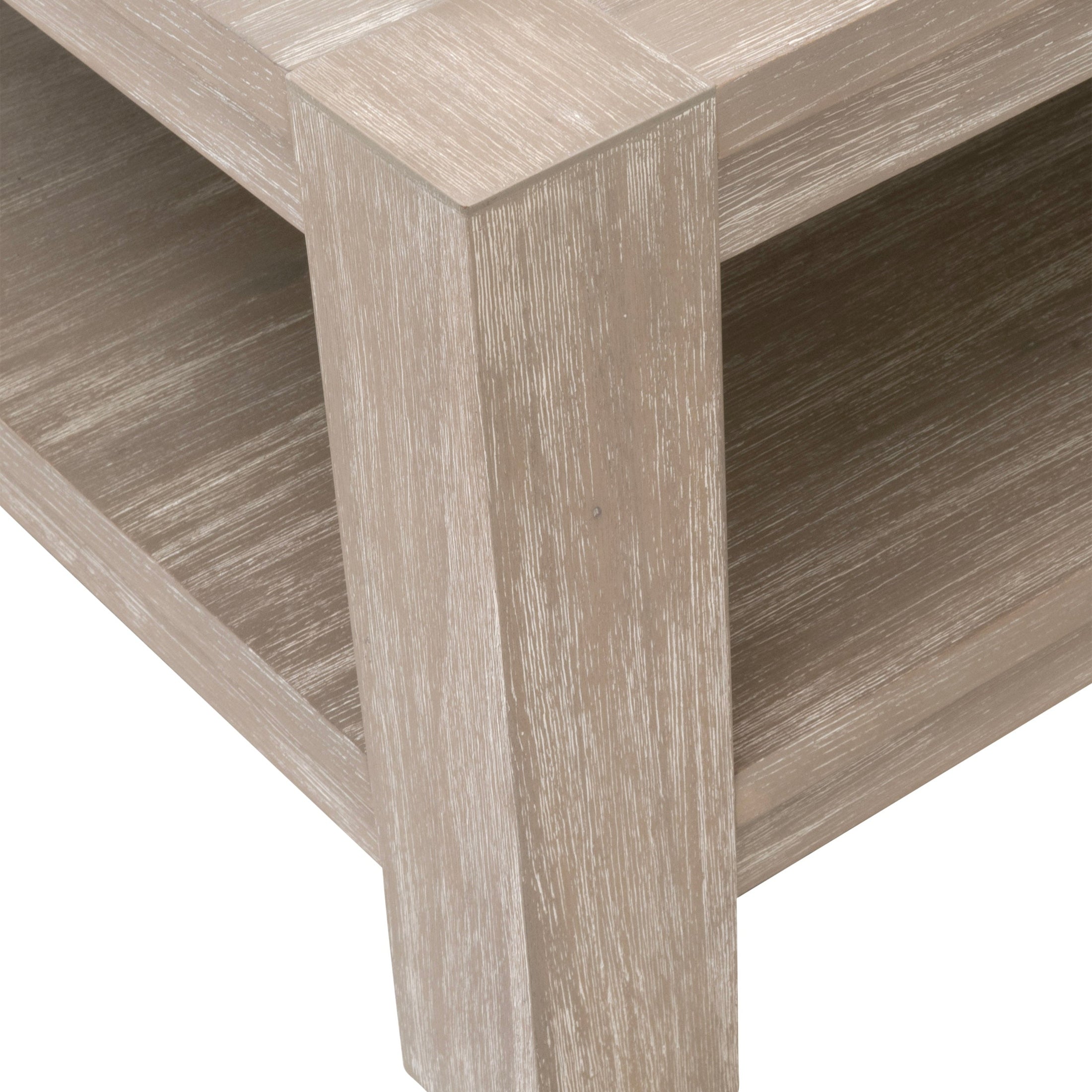 Close-up of Adler Rectangular Coffee Table leg and lower shelf with natural gray acacia veneer by Essentials for Living