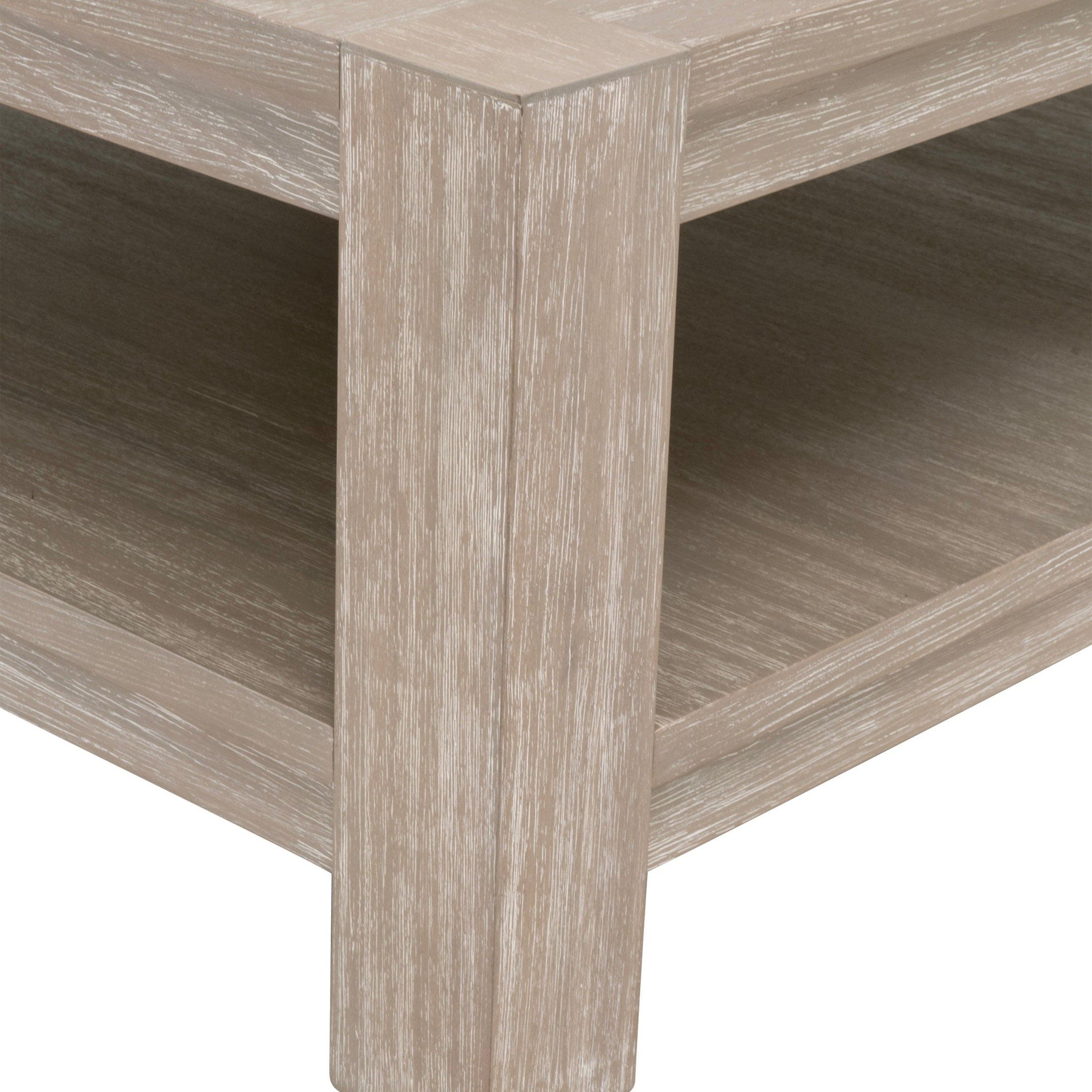 Close-up of Adler Square Coffee Table’s natural gray distressed acacia veneer and solid beech wood frame by Essentials for Living