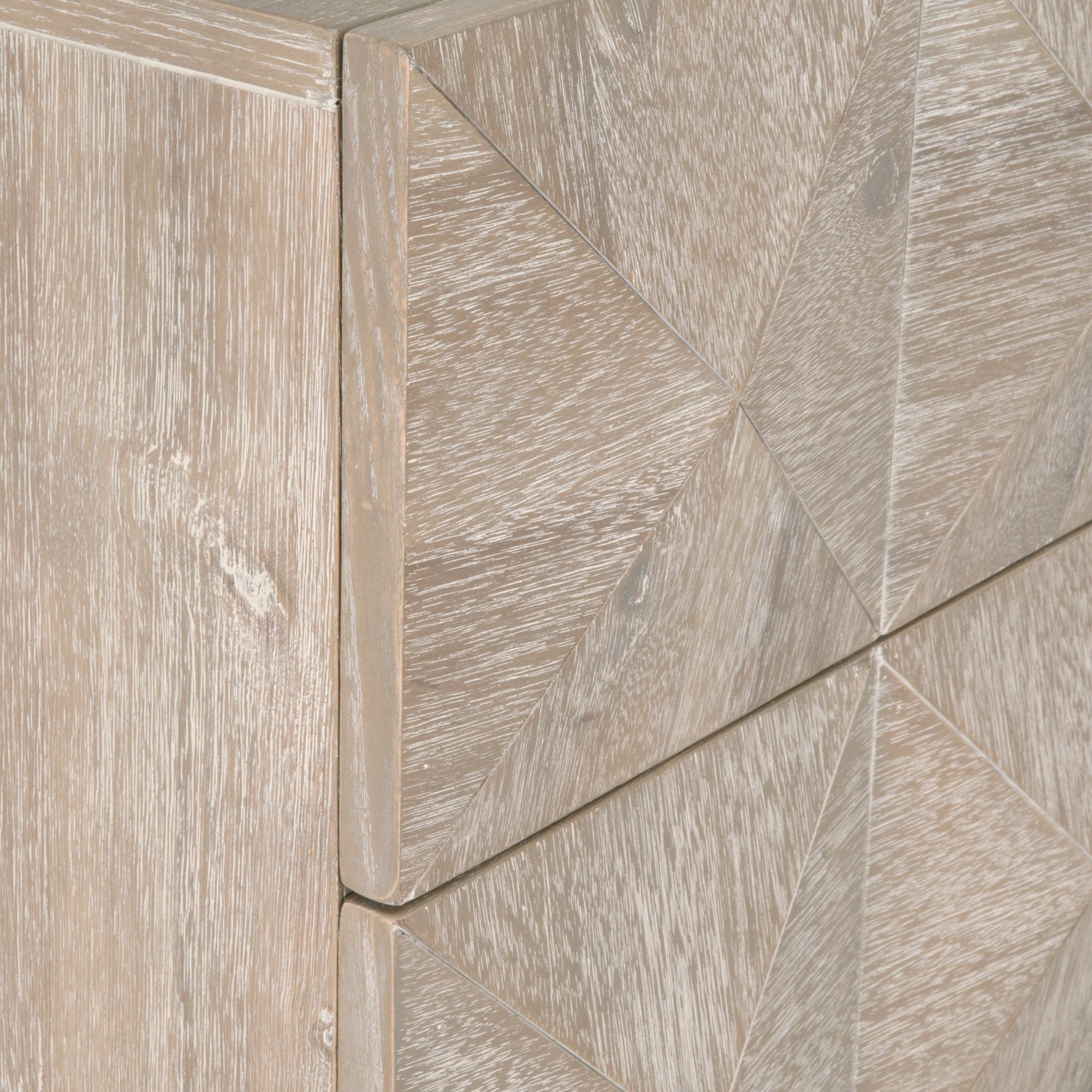 Close-up of the 3D diamond-pattern drawer fronts on the Atlas 6-Drawer Double Dresser by Essentials For Living.