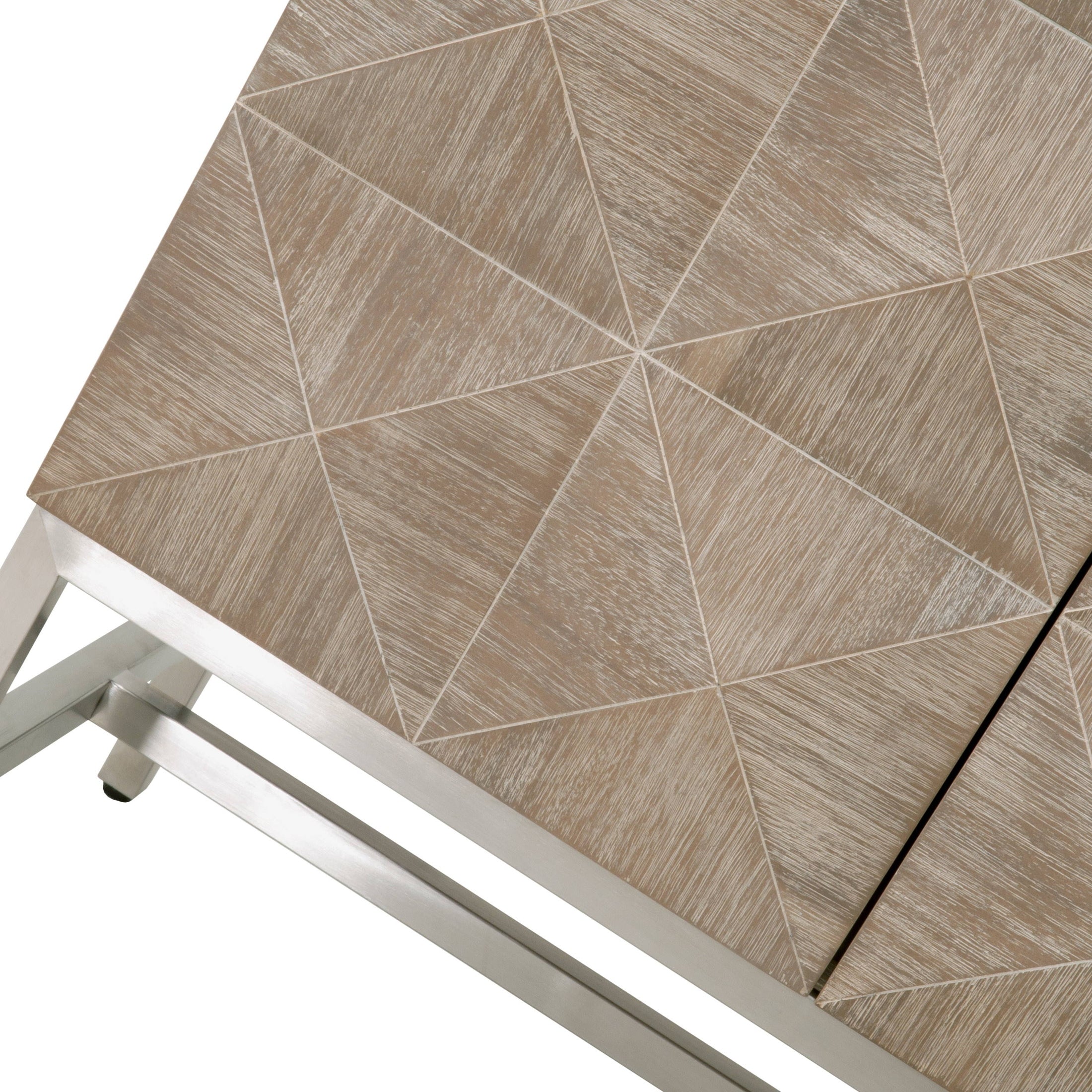 Close-up of Atlas Media Sideboard 3D diamond-pattern doors and stainless steel base by Essentials For Living