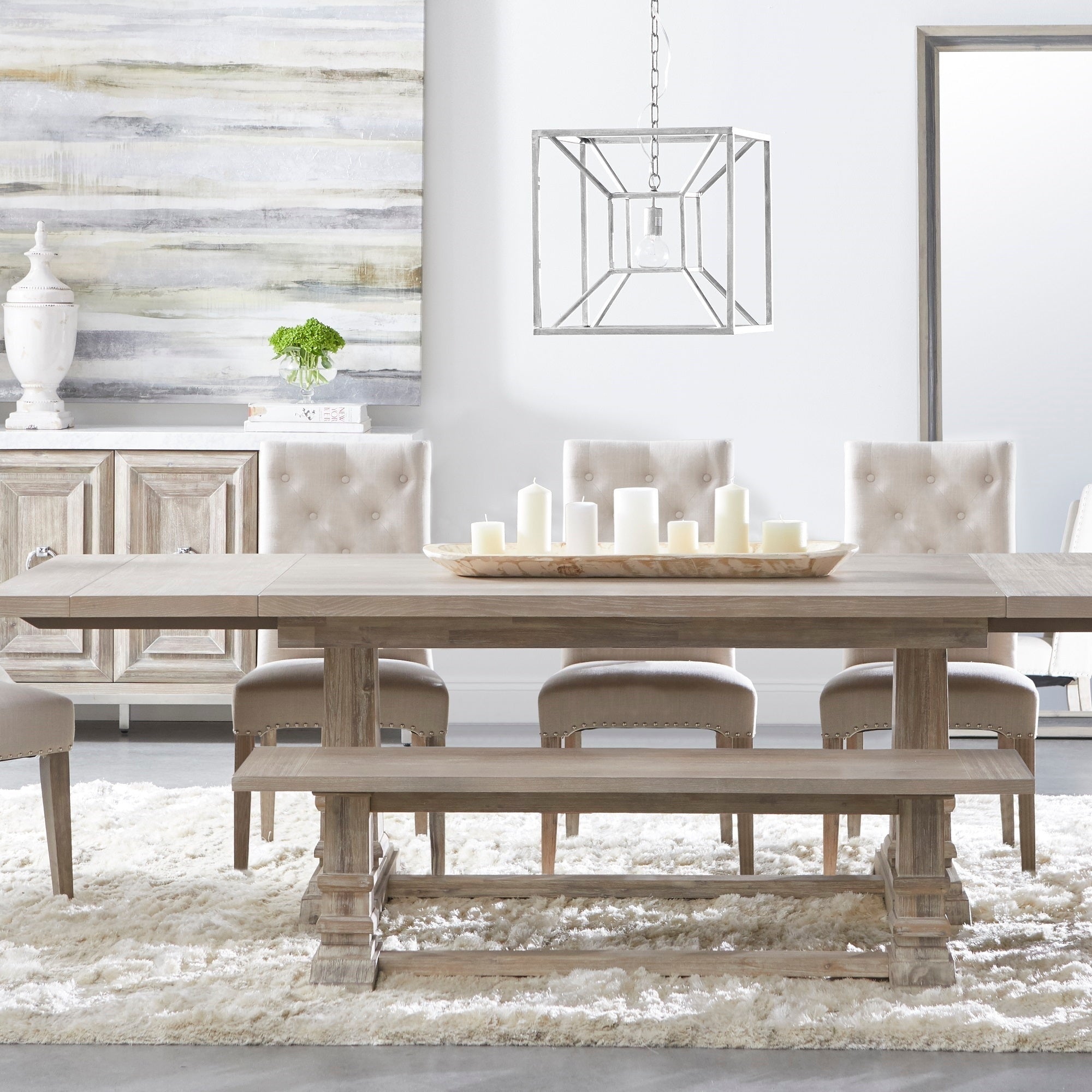 Dining room with rustic wood table, tufted chairs, bench, and sideboard with decor, Essentials For Living Azure Carrera Media Sideboard
