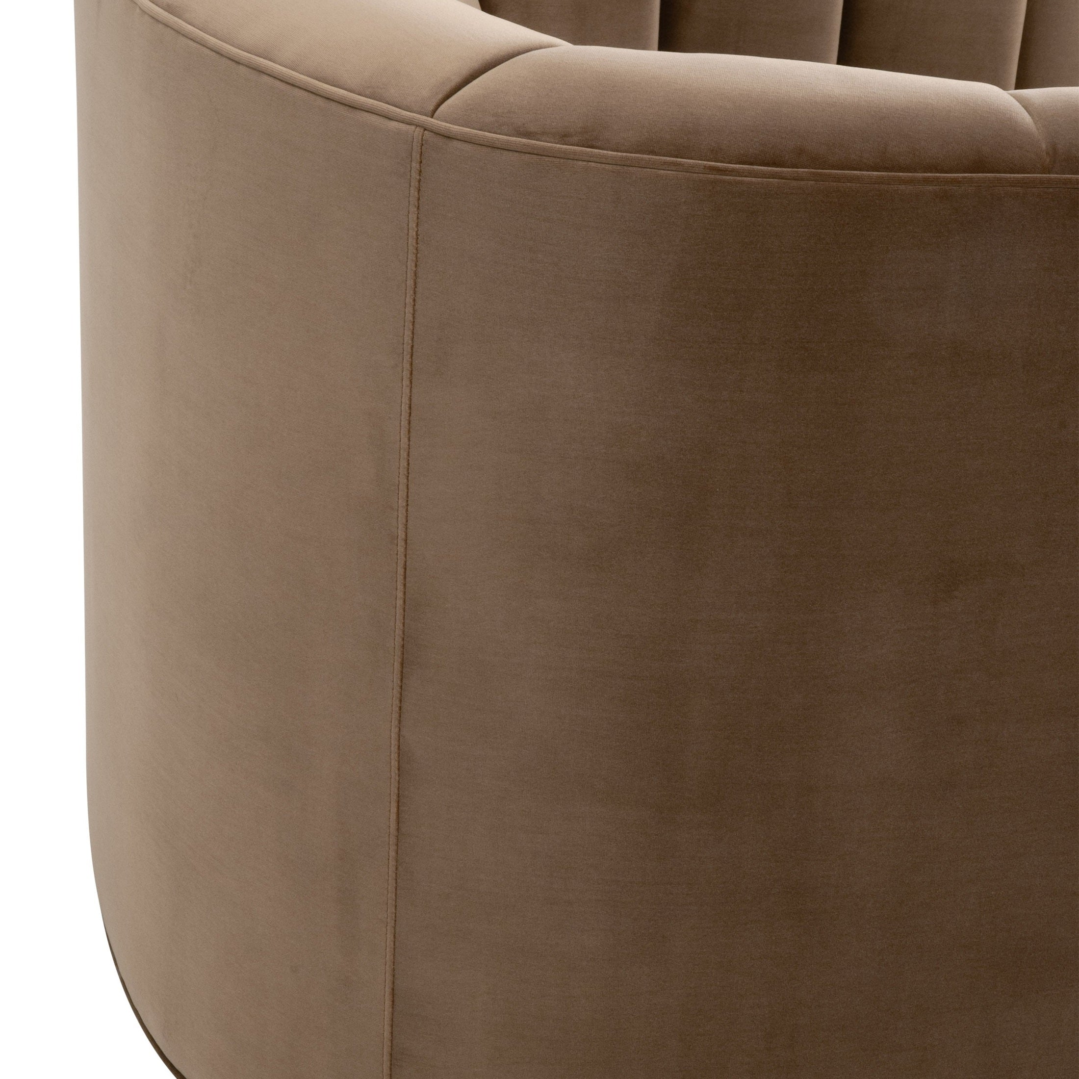 Close-up of caramel velvet upholstery and curved channel back of Bronx Channel Back Sofa Chair by Essentials for Living