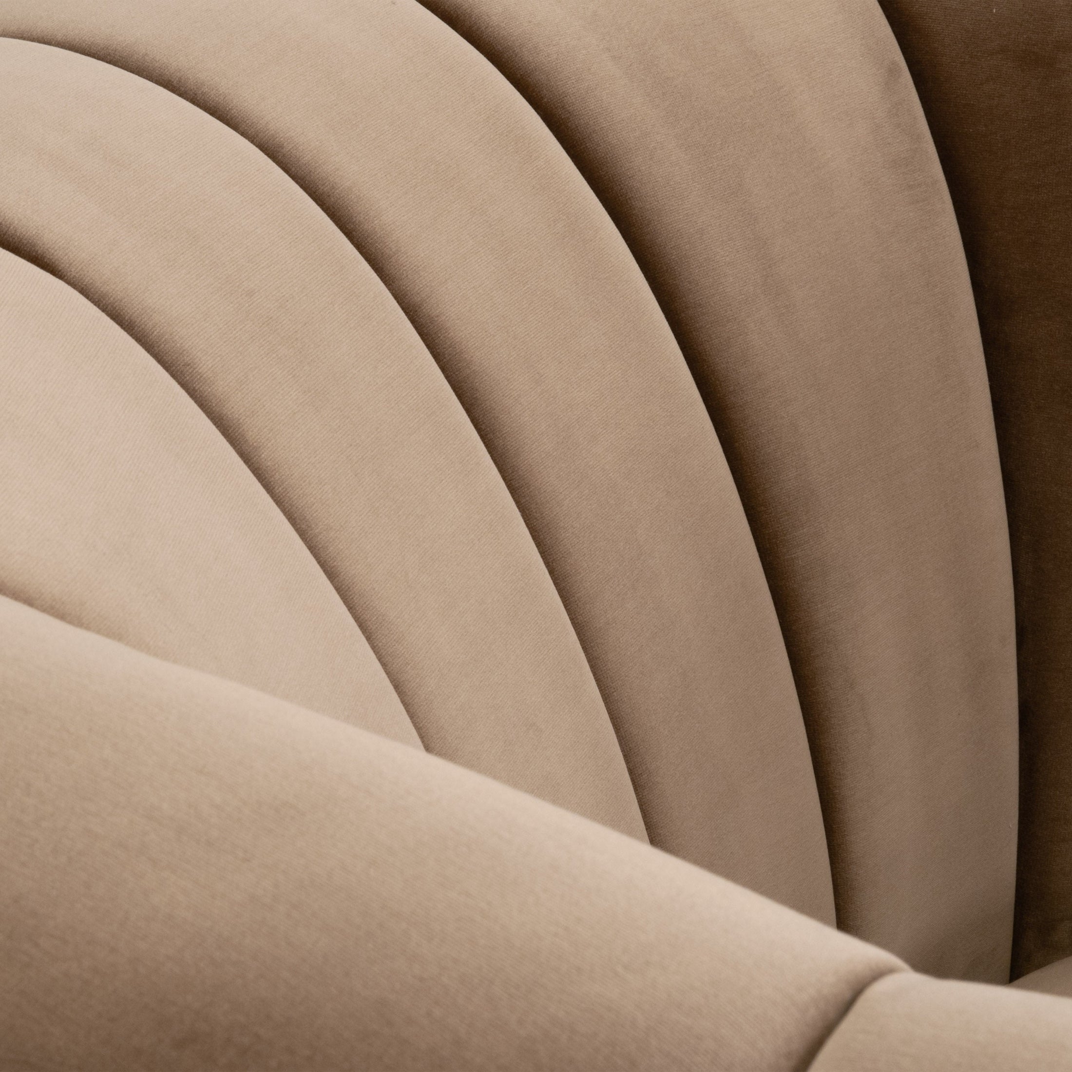 Close-up of the caramel velvet vertical channel back on the Bronx Channel Back Sofa Chair by Essentials for Living
