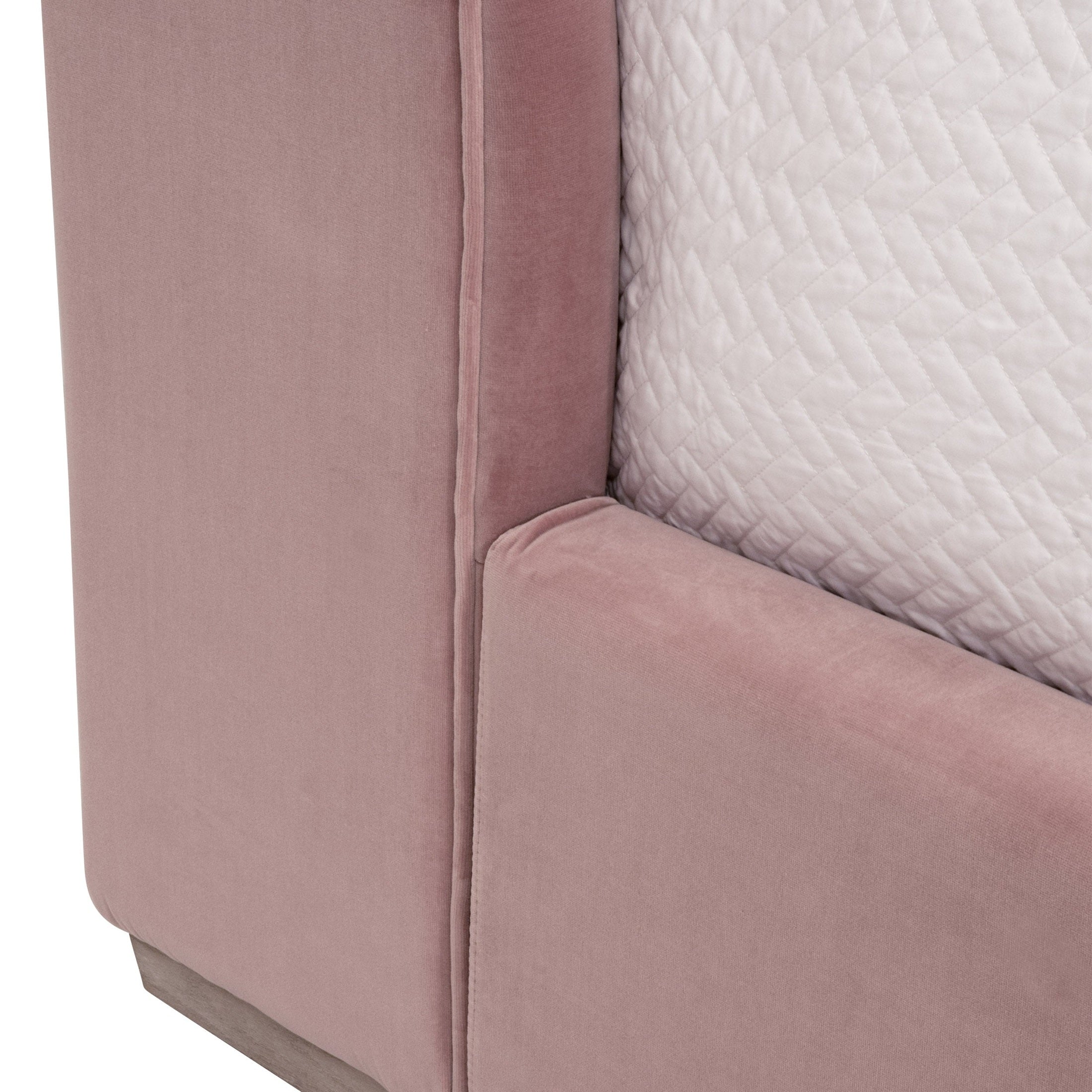 Close-up of the curved wingback headboard and footboard of the Balboa Queen Bed by Essentials for Living.