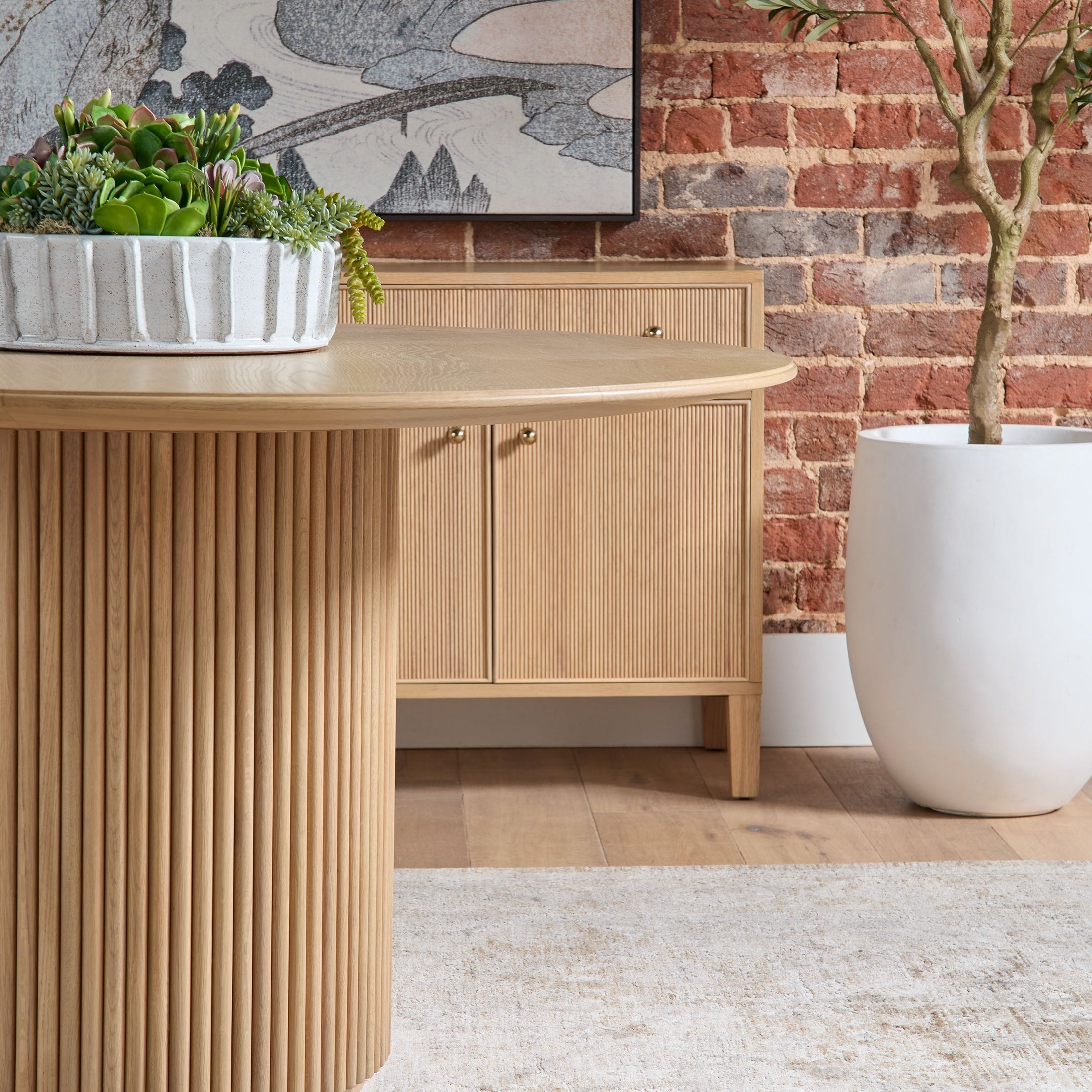 Belfast 54" Round Dining Table with fluted pedestal base in natural oak wood grain by Essentials for Living