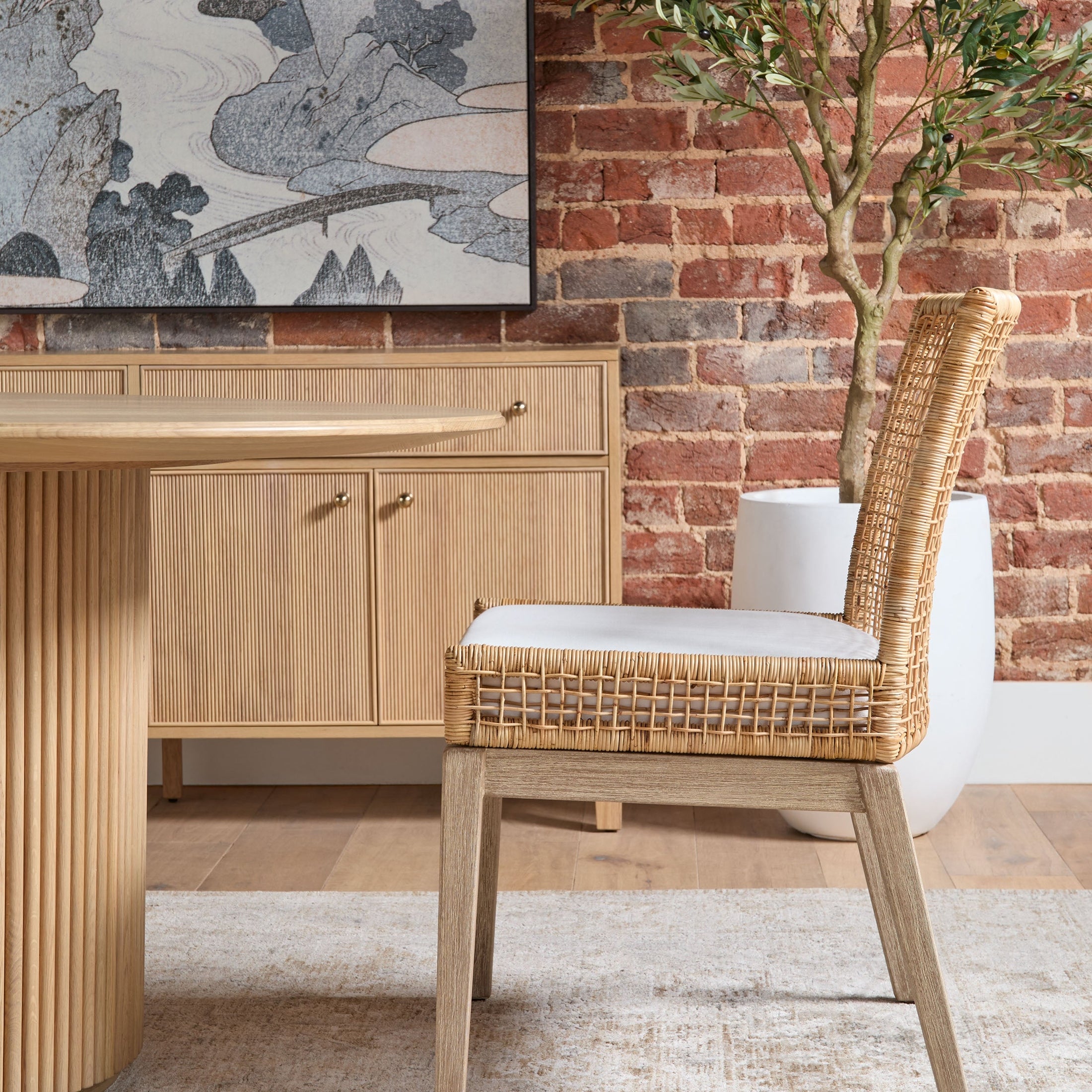 Belfast 54" Round Dining Table in natural oak with fluted pedestal base in stylish dining room Essentials for Living