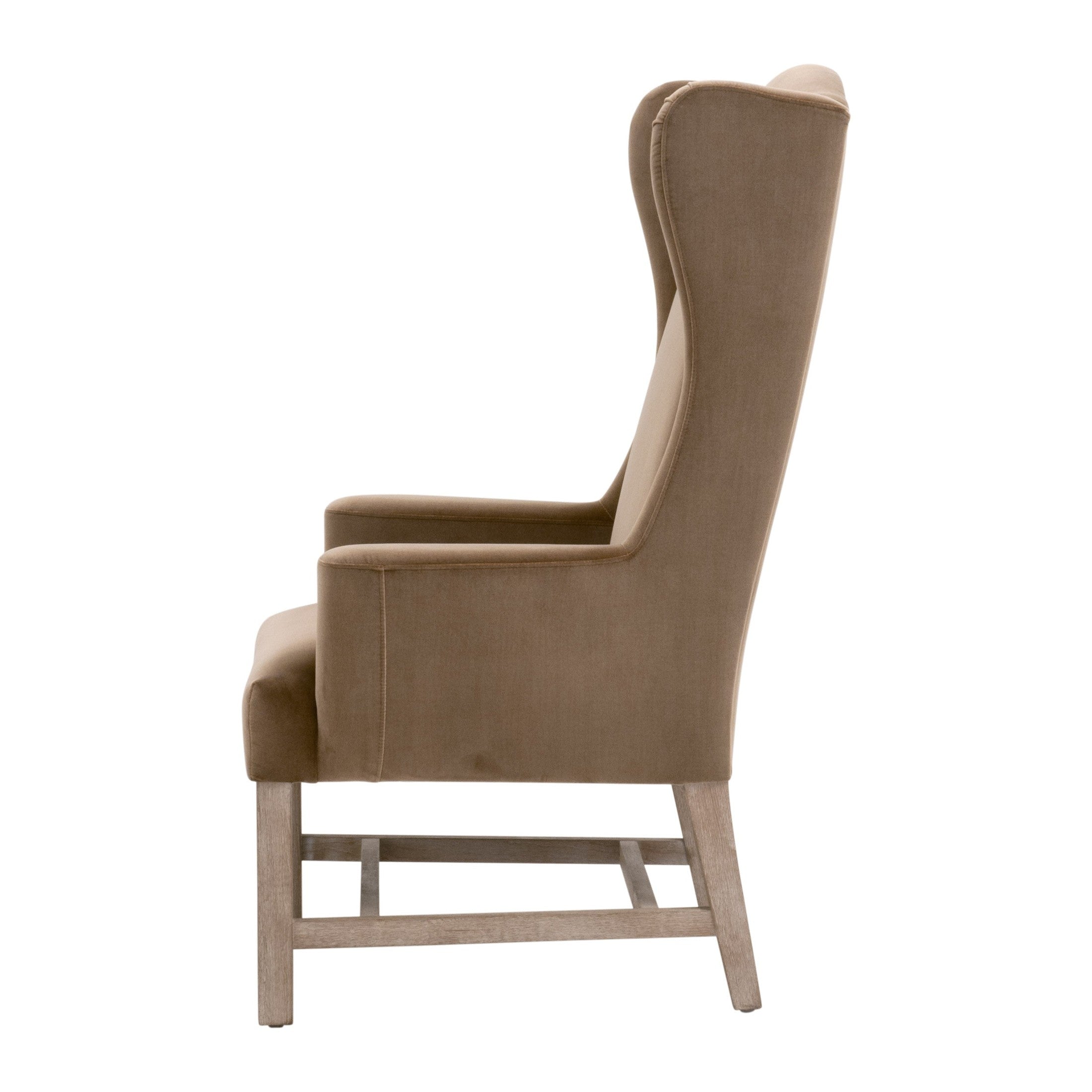 Side view of Bennett Arm Chair in dark caramel velvet with gray oak legs by Essentials for Living
