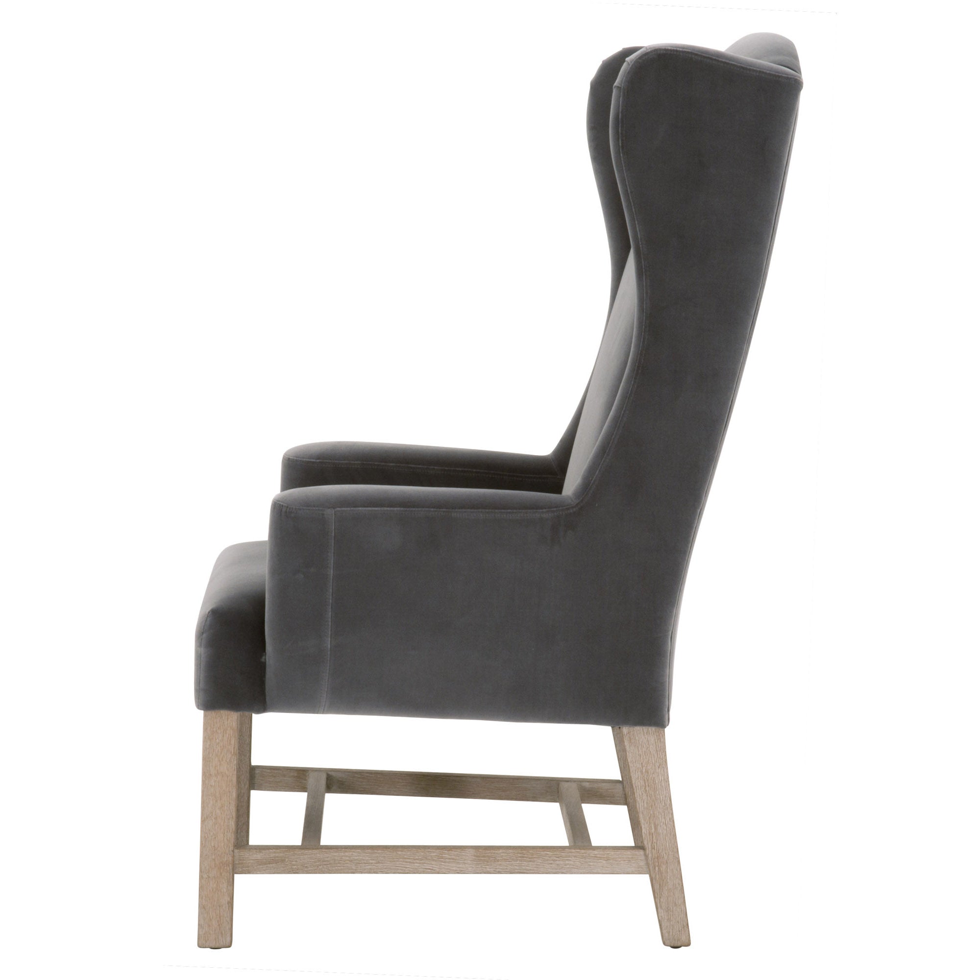 Bennett Arm Chair in dark gray velvet with solid gray oak legs and wingback design by Essentials for Living