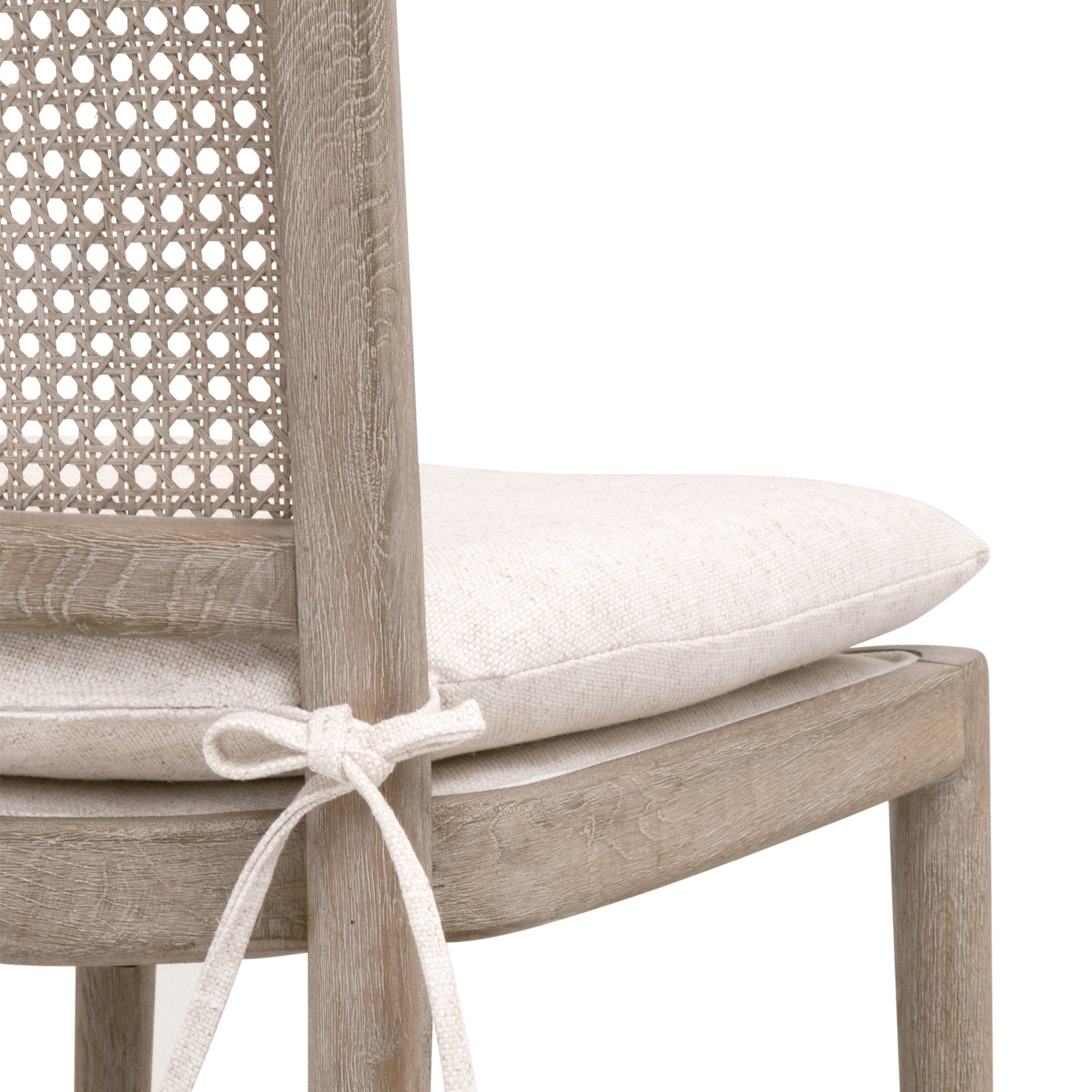 Close-up of Blume Counter Stool with cane back and cream linen removable cushion by Your Noble Nest