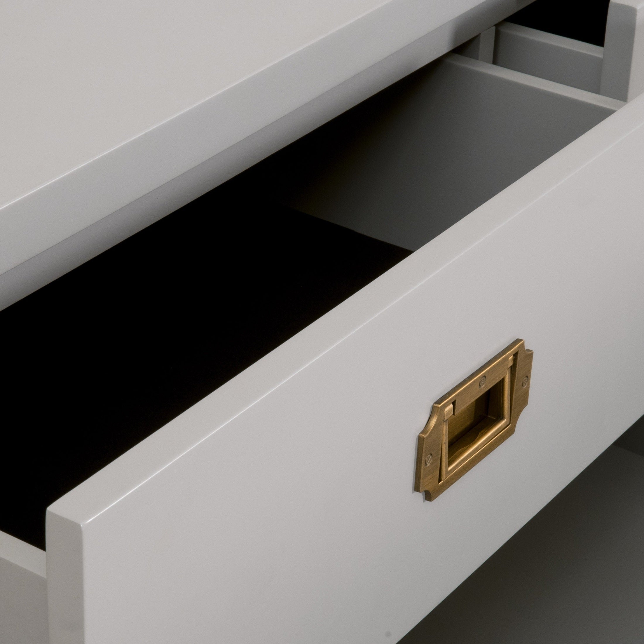 Close-up of open drawer with brushed gold hardware on Bradley 7-Drawer Double Dresser by Essentials for Living