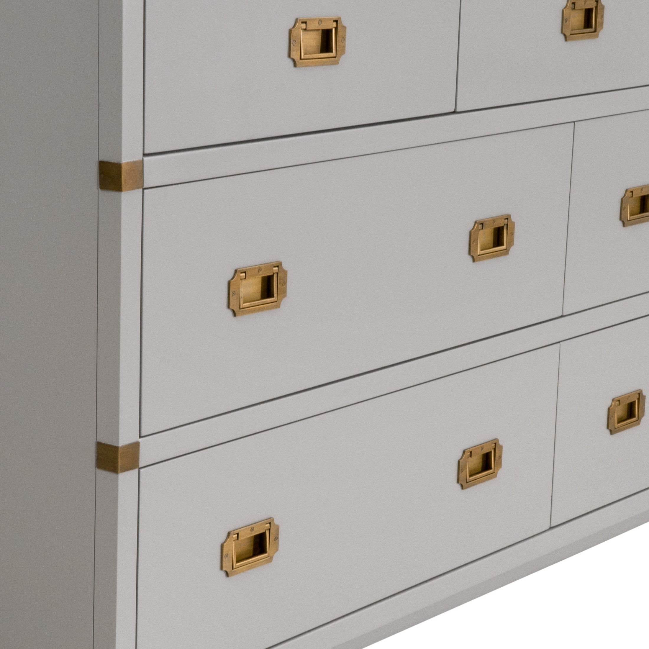 Close-up of Bradley 7-Drawer Double Dresser in dove gray with brushed gold handles by Essentials for Living.