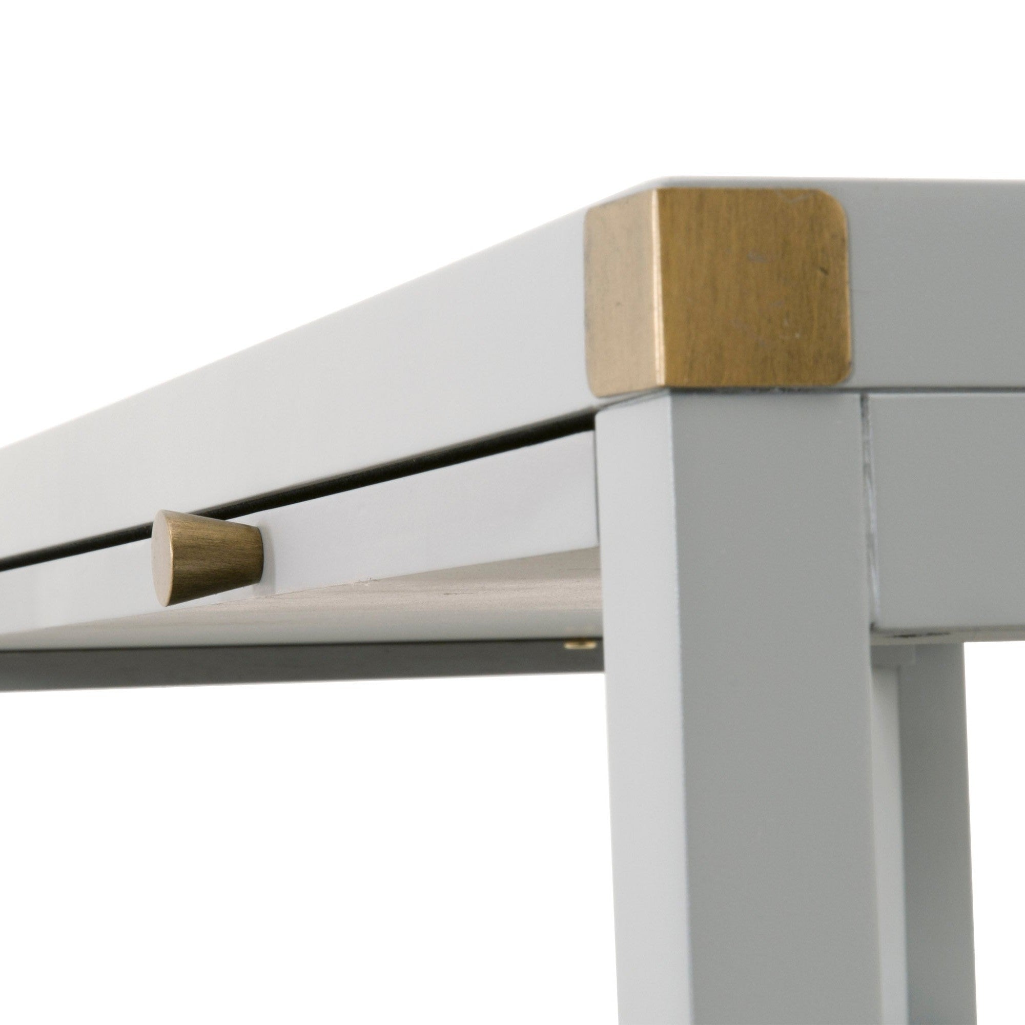 Close-up of white Bradley 2-Drawer Nightstand corner with gold hardware by Essentials For Living