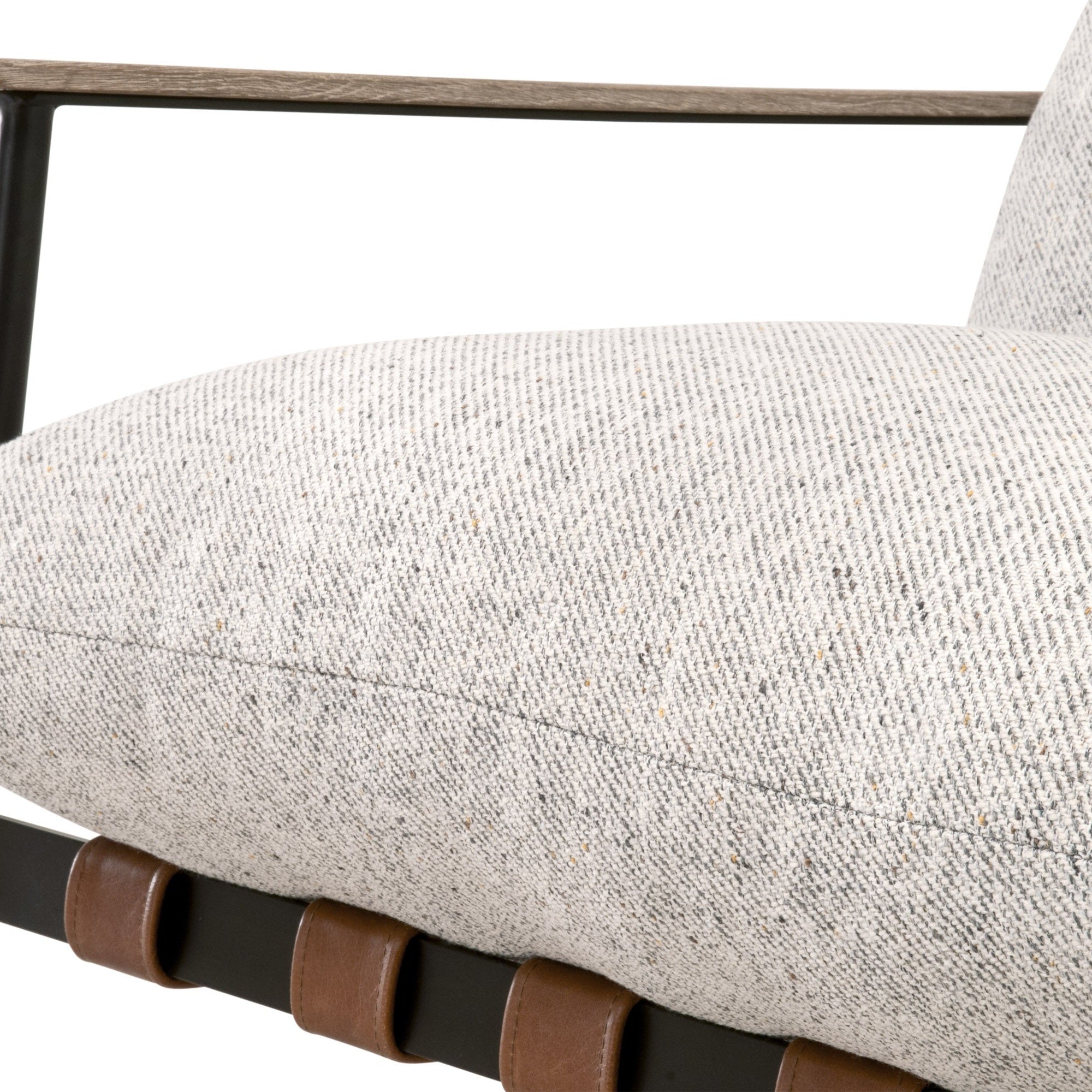 Close-up of Brando Club Chair cushion with chestnut leather straps and gray oak armrest by Essentials for Living