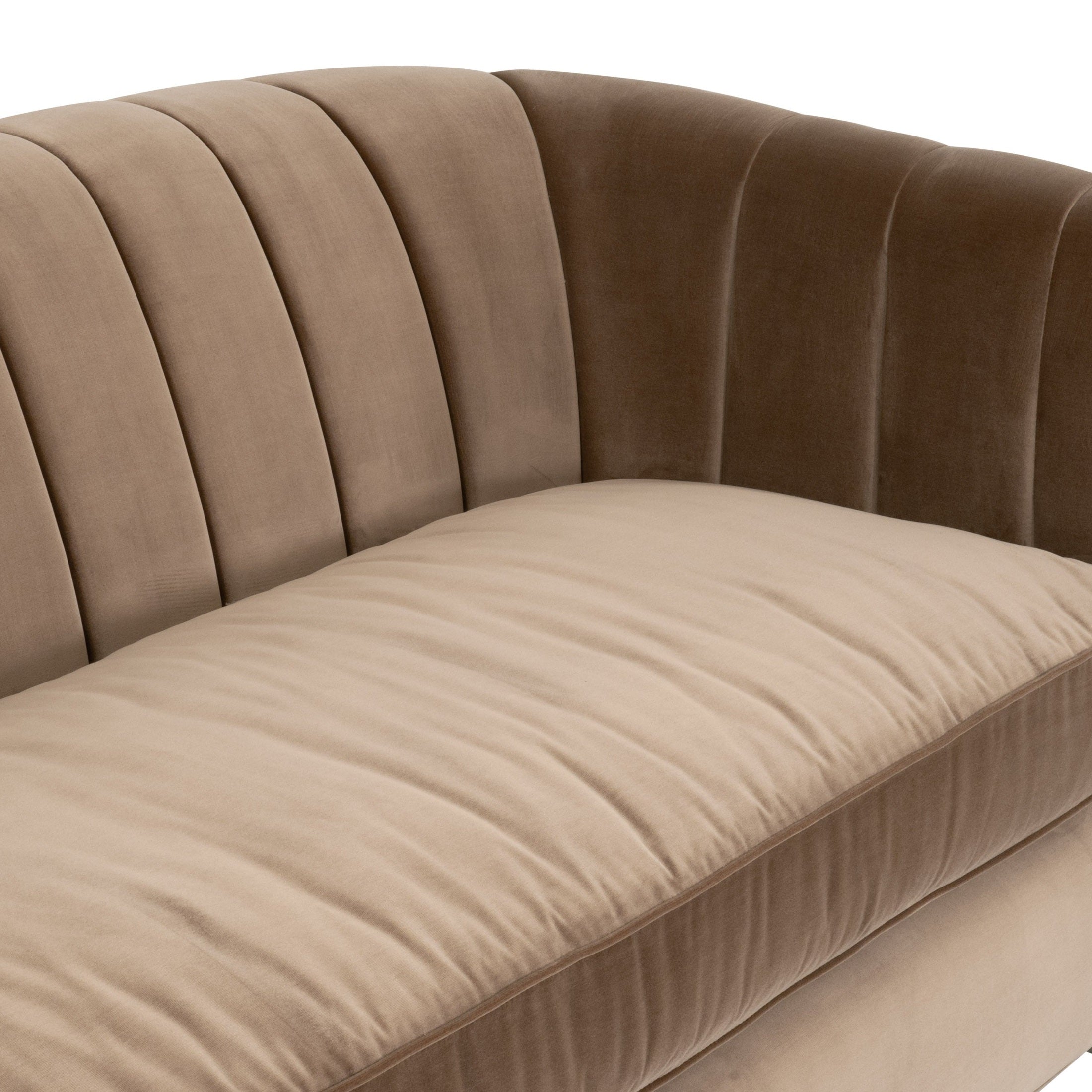 Close-up of Bronx 87 Channel Back Sofa in caramel velvet with vertical stitching and oak feet by Essentials for Living.