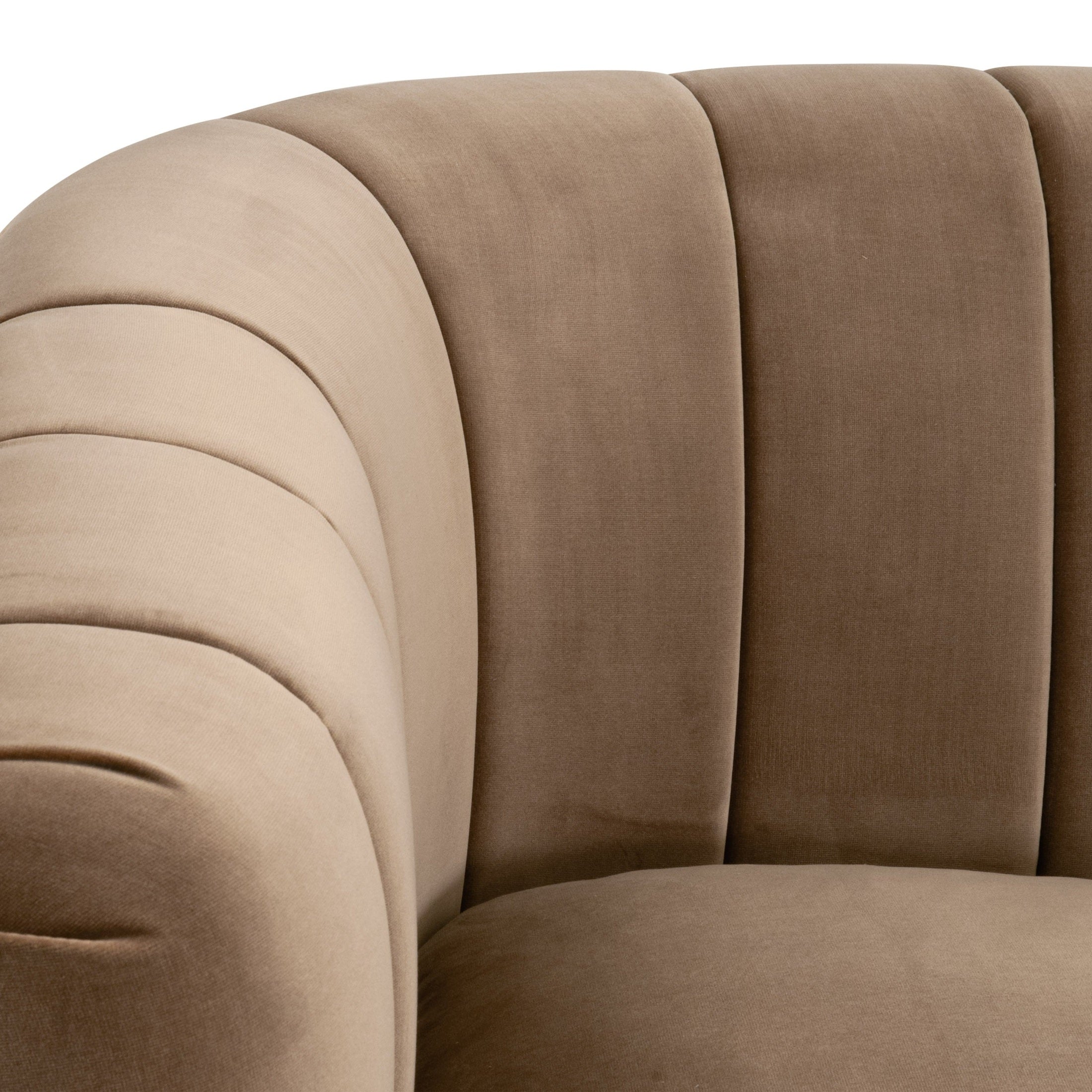 Close-up of caramel velvet upholstery and vertical channel back on Bronx 87" Channel Back Sofa by Essentials for Living.