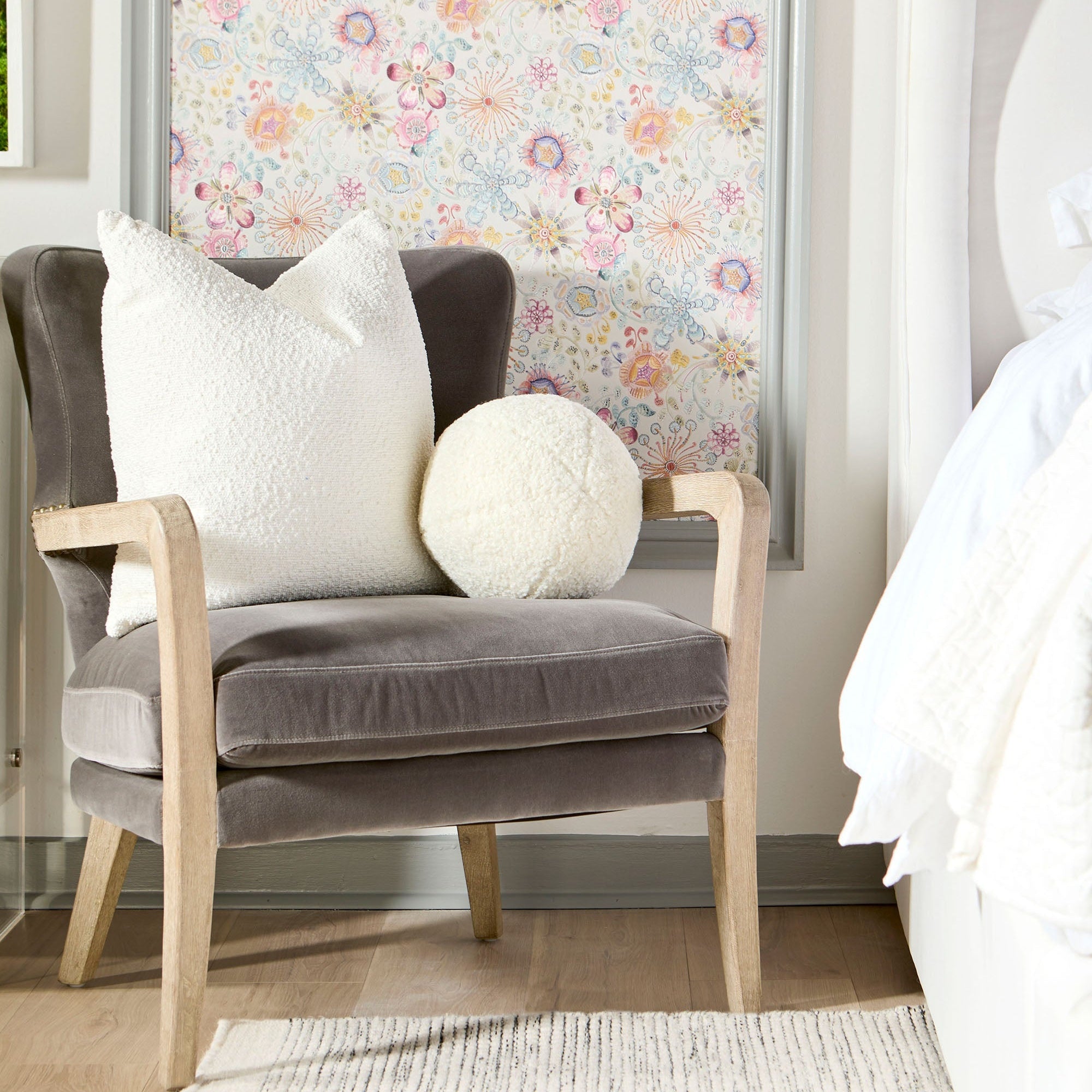 Calvin Club Chair in dark gray velvet with oak arms and gold nailhead trim by Essentials For Living