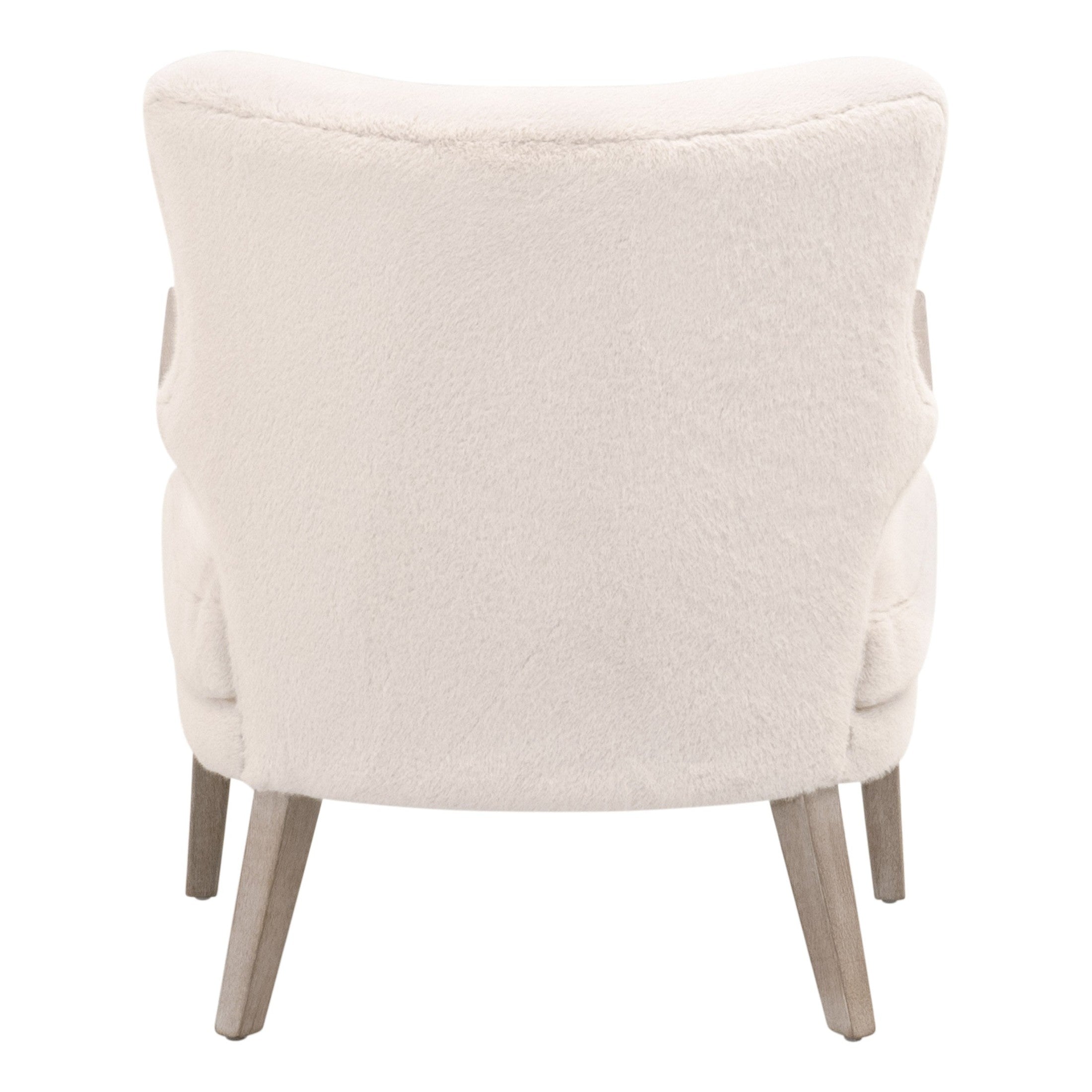 Back view of Calvin Club Chair in light fabric with wooden legs by Essentials for Living