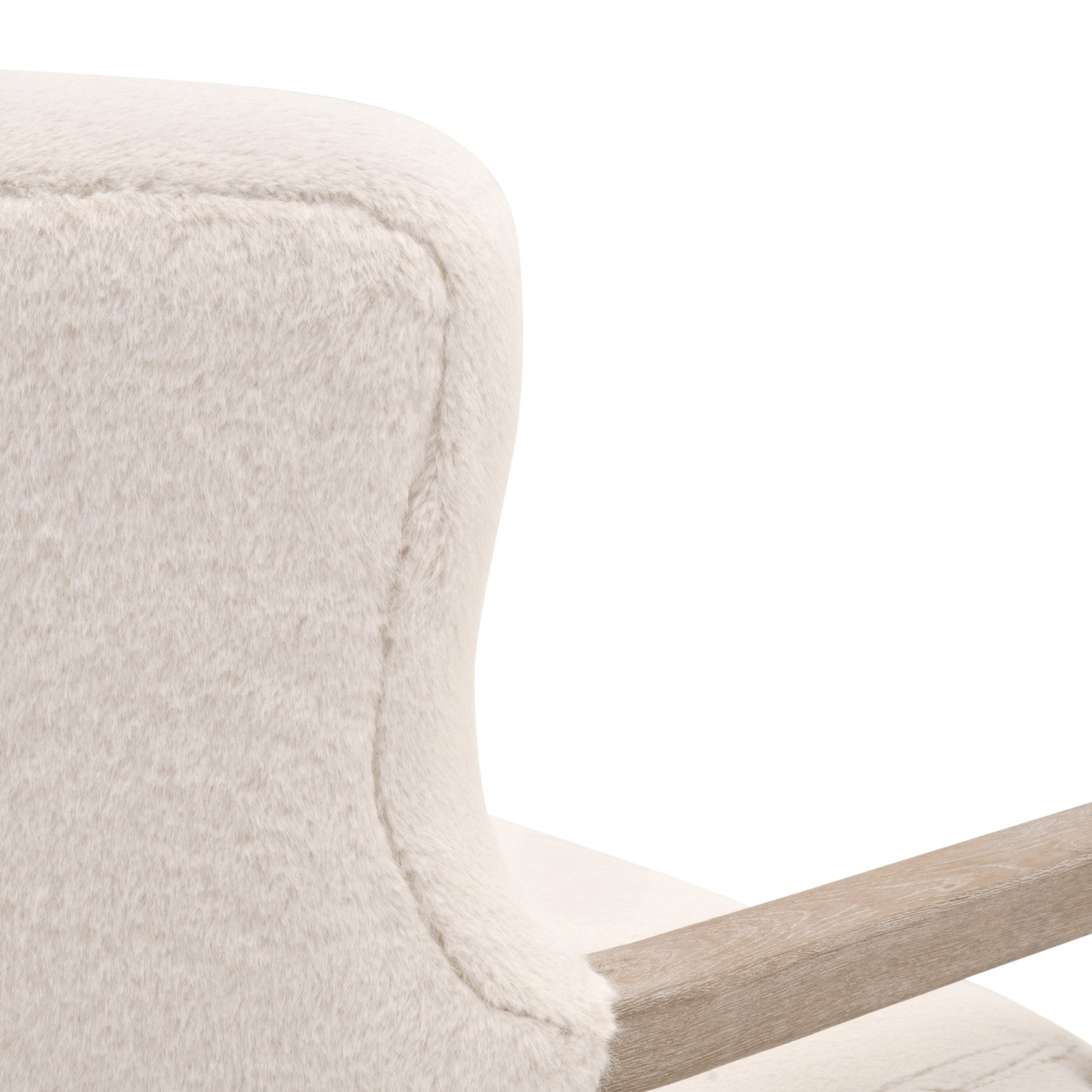 Close-up of a cream fabric and natural oak wood arm detail on Calvin Club Chair by Essentials For Living