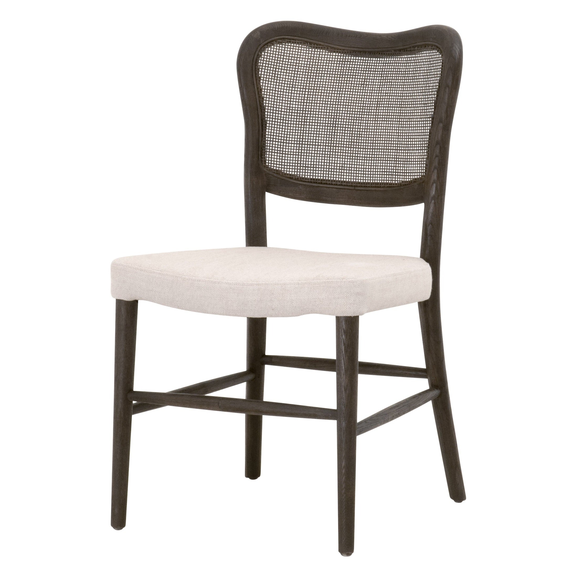 Essentials For Living Cela Dining Chair with natural gray oak frame, handwoven cane back, and bisque upholstered seat.