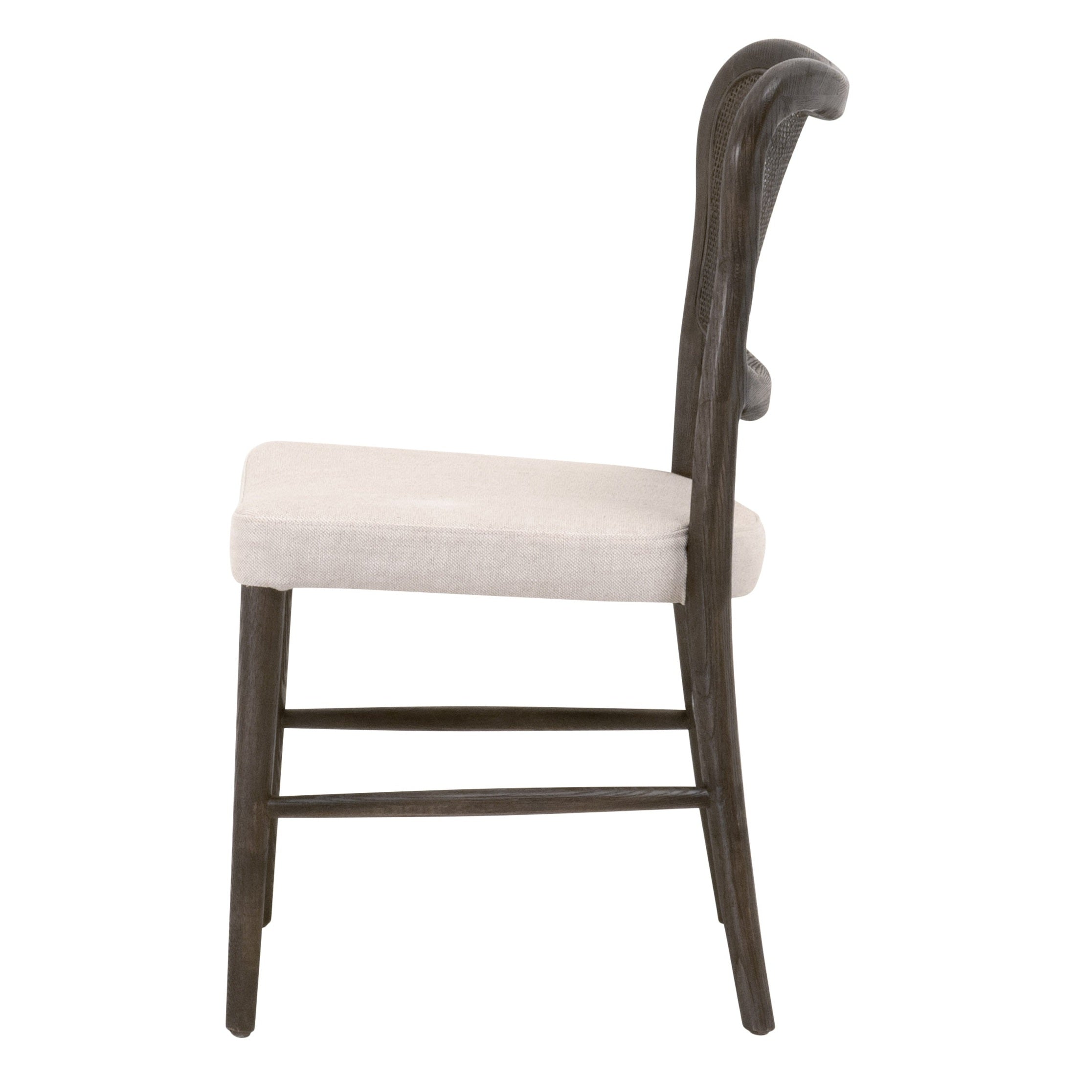 Side view of Cela Dining Chair by Essentials For Living with bisque upholstered seat and dark wood frame