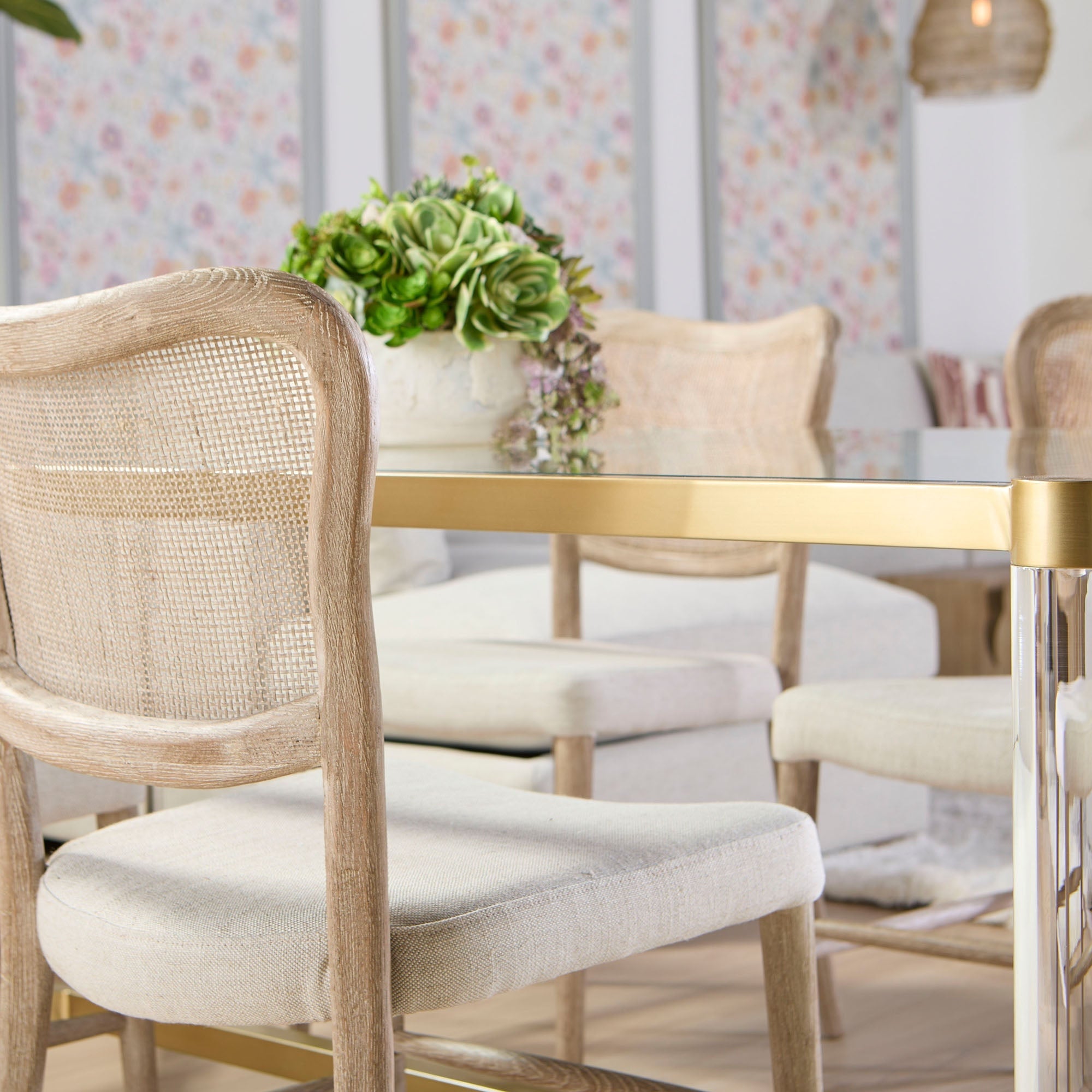 Set of two Cela Dining Chairs by Essentials For Living with handwoven cane backs and bisque upholstered seats