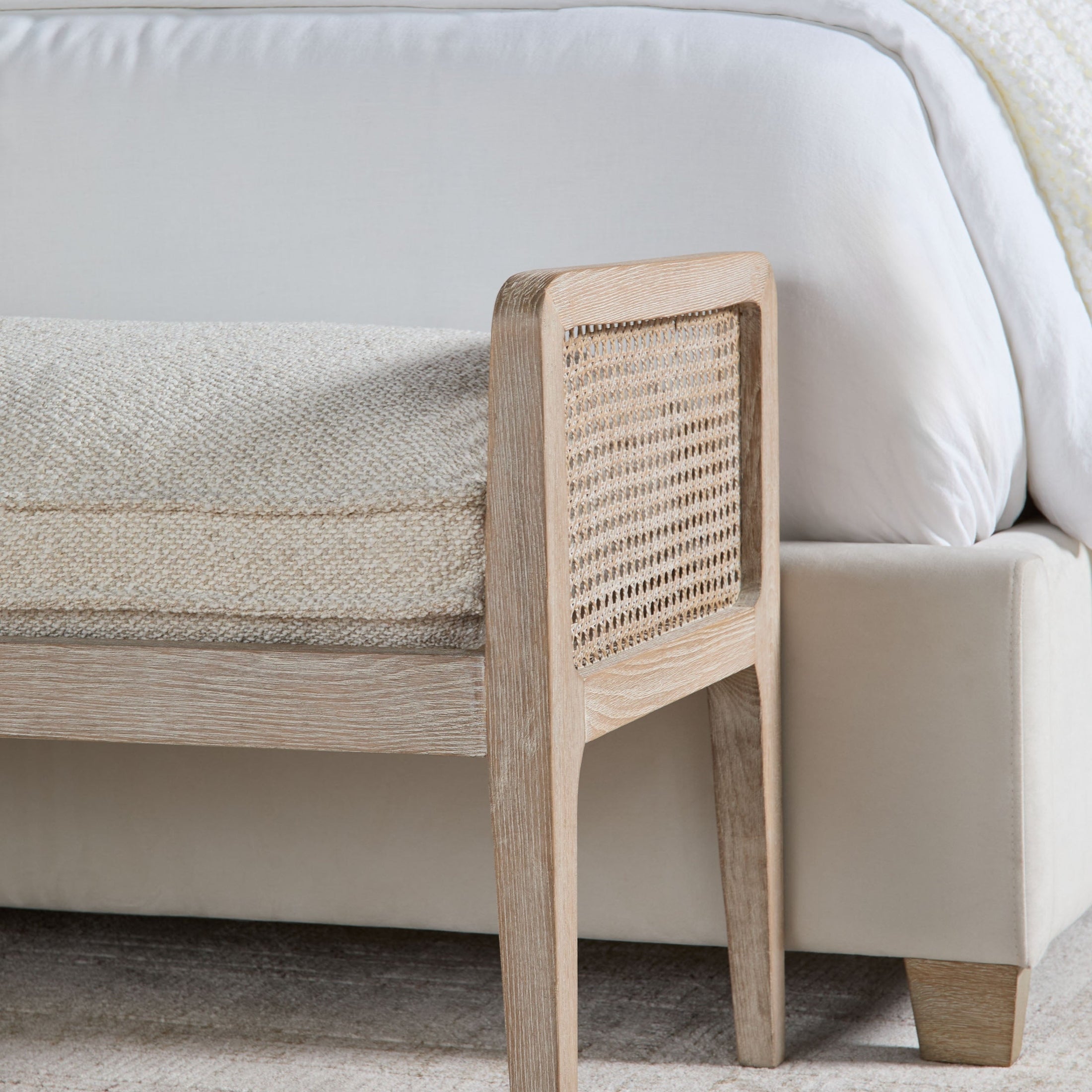 Close-up of Chandler Standard King Bed corner with woven oak and cream upholstery by Essentials for Living