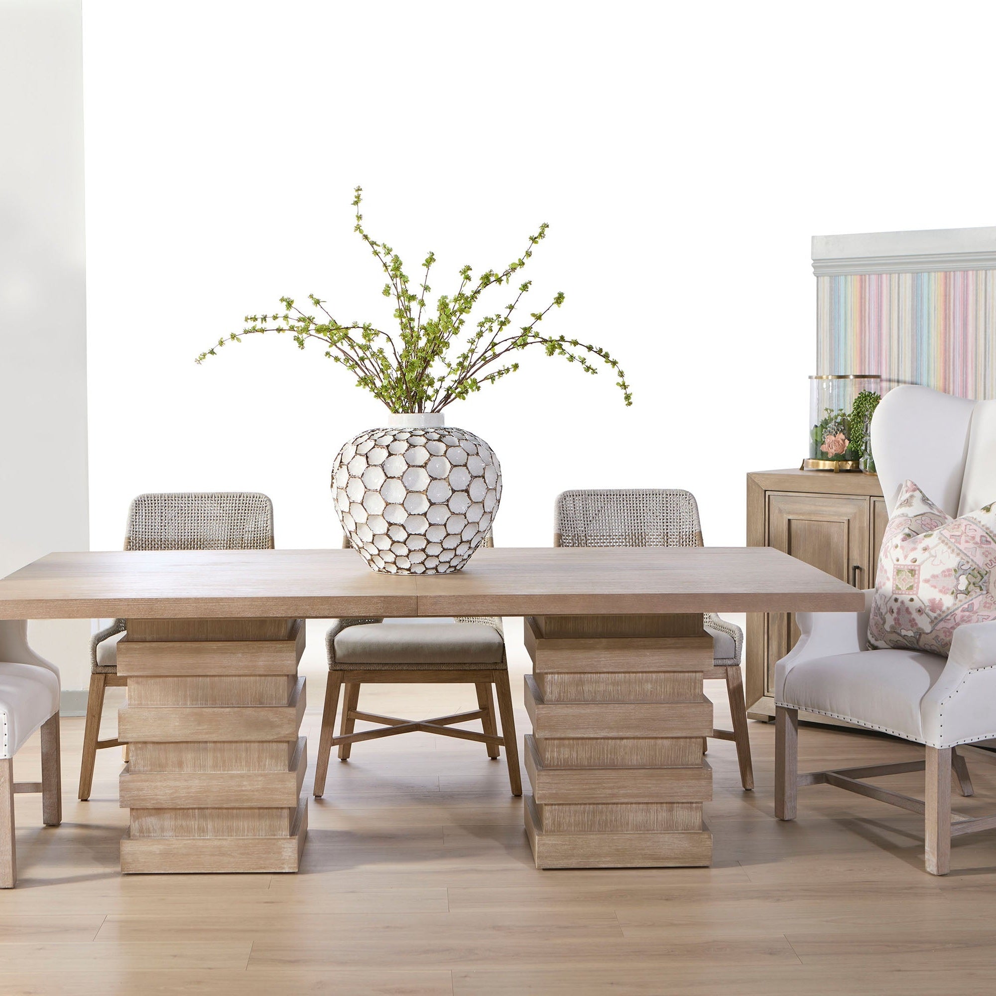 Elegant Chateau arm chair with rolled arms and nail tack details in a light linen fabric by Essentials for Living