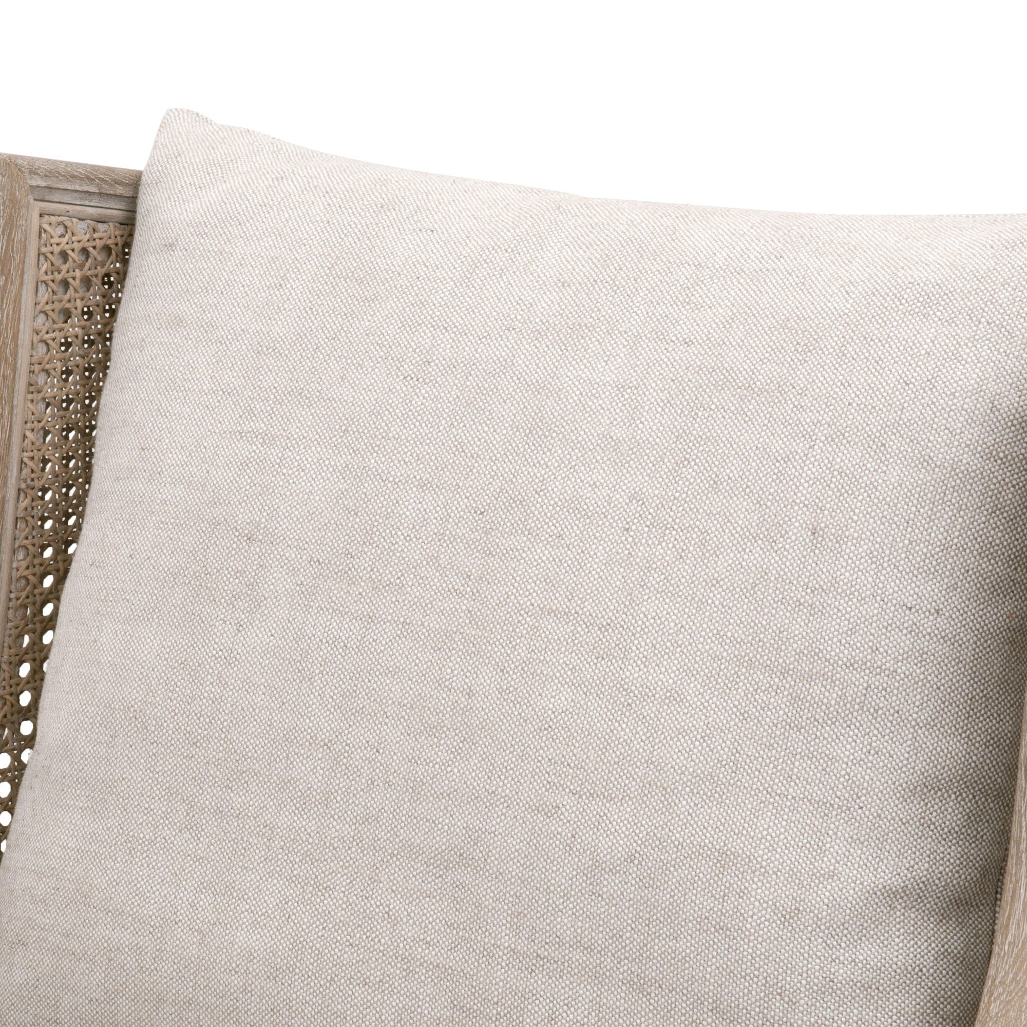 Beige linen-blend cushion on Churchill Club Chair with natural gray oak frame and rattan cane sides by Essentials For Living