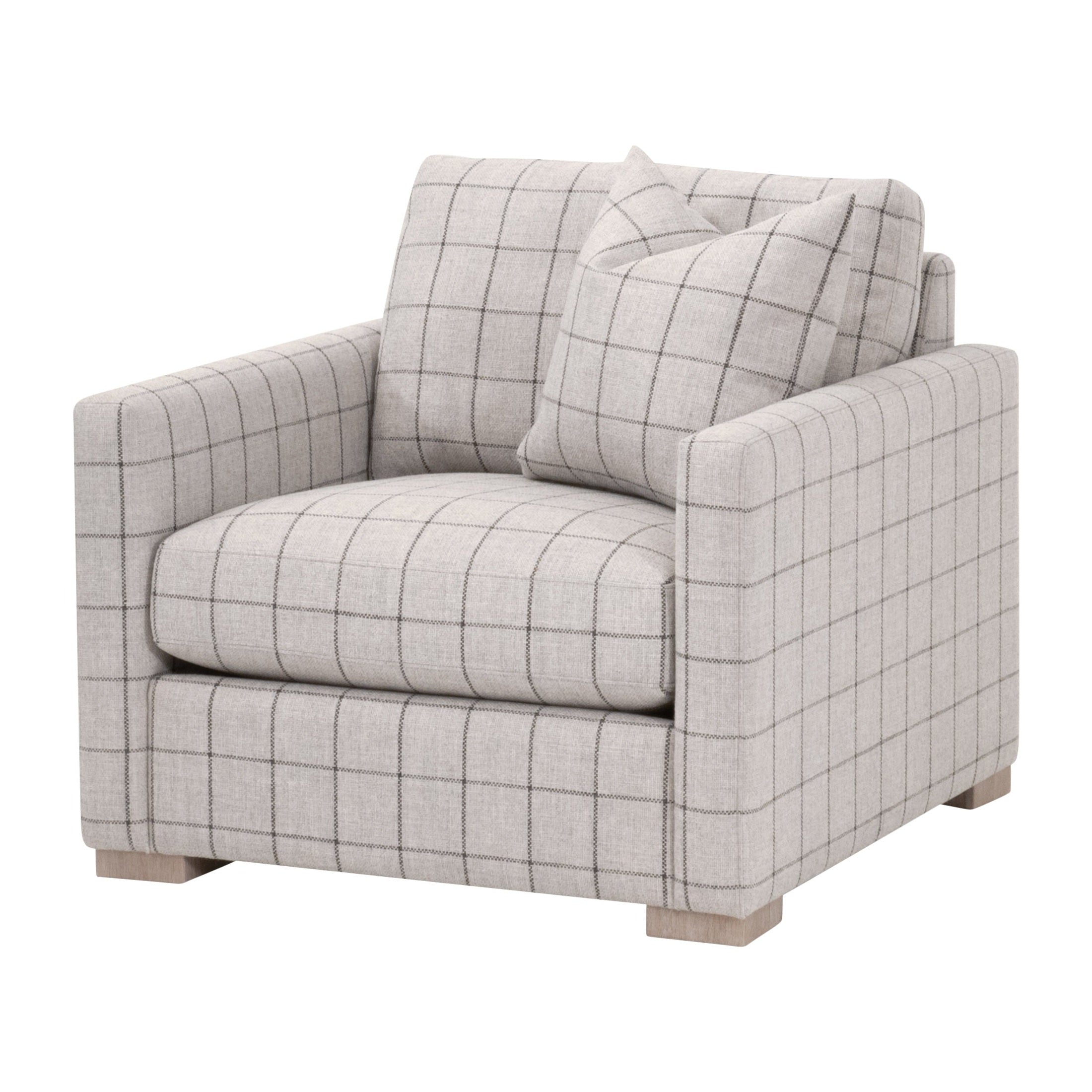 Light gray grid-patterned slim arm sofa chair with plush cushions and solid wood feet by Essentials for Living