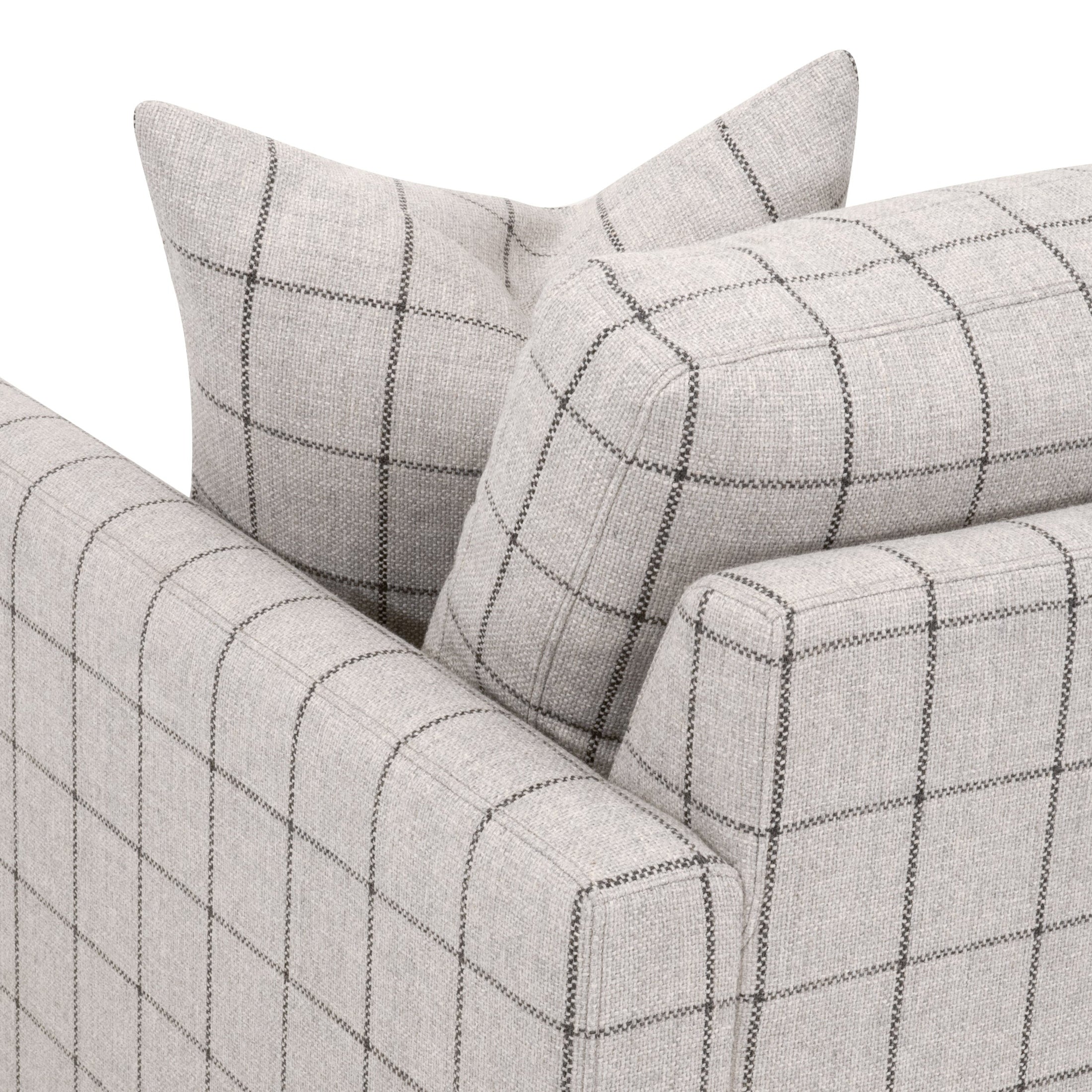 Close-up of light gray basketweave fabric and patterned cushions on Clara Slim Arm Sofa Chair by Essentials for Living