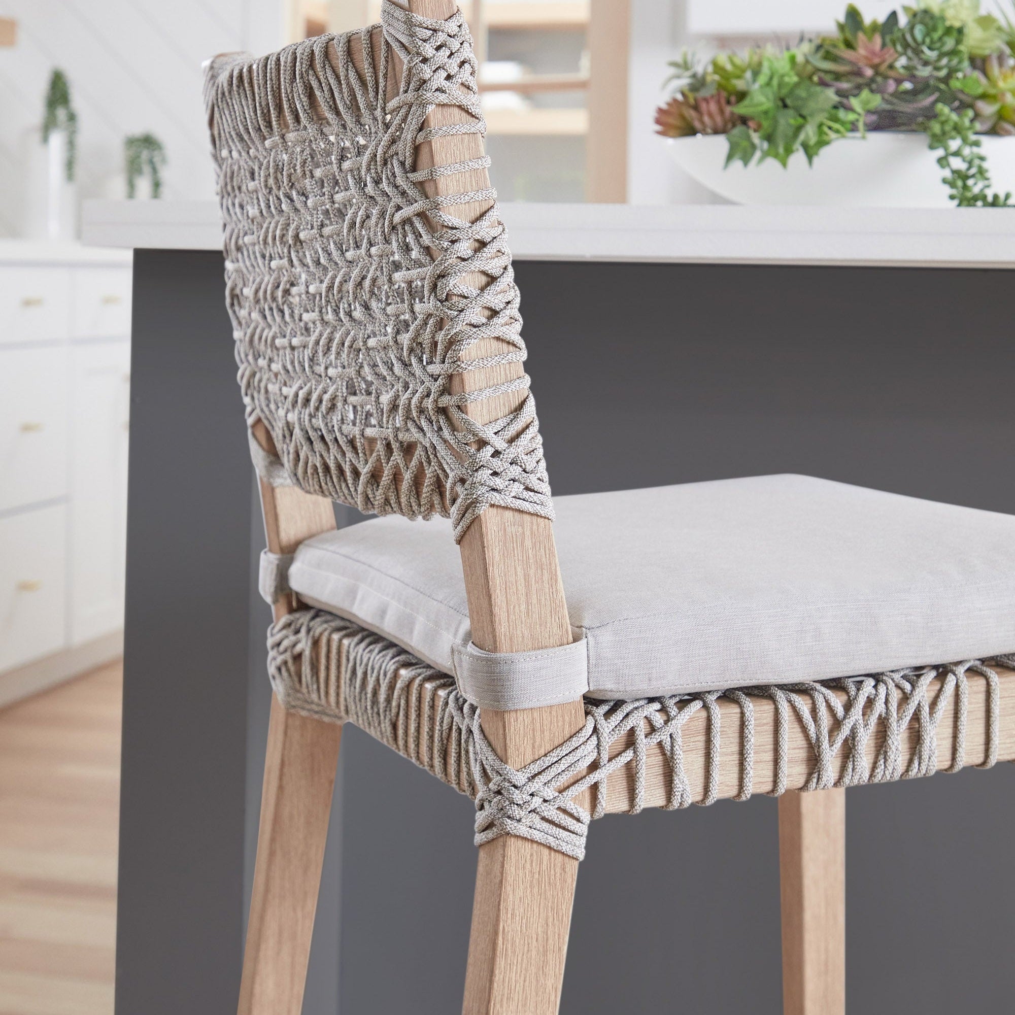 Essentials for Living Costa Counter Stool with woven taupe polypropylene and cushioned seat on distressed gray mahogany frame