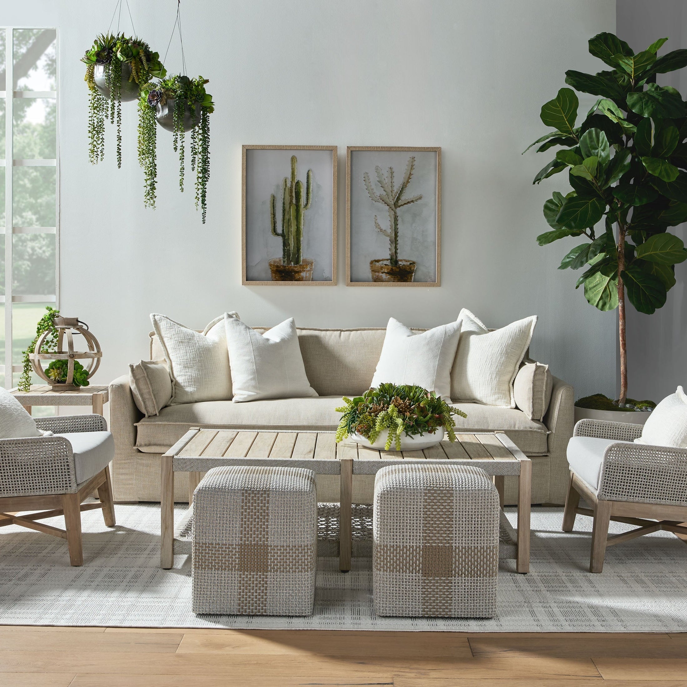 Modern living room with Essentials For Living Cross Accent Cube in taupe and white rope weave design