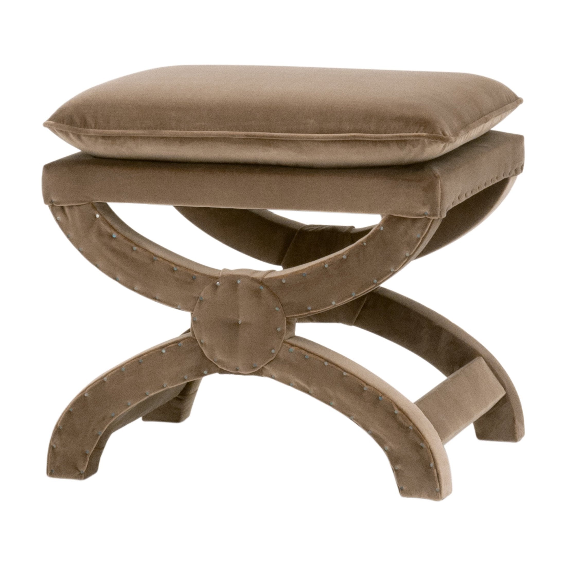 Gaston Ottoman in soft beige velvet with X-shaped base and nailhead trim, stylish and compact seating solution.