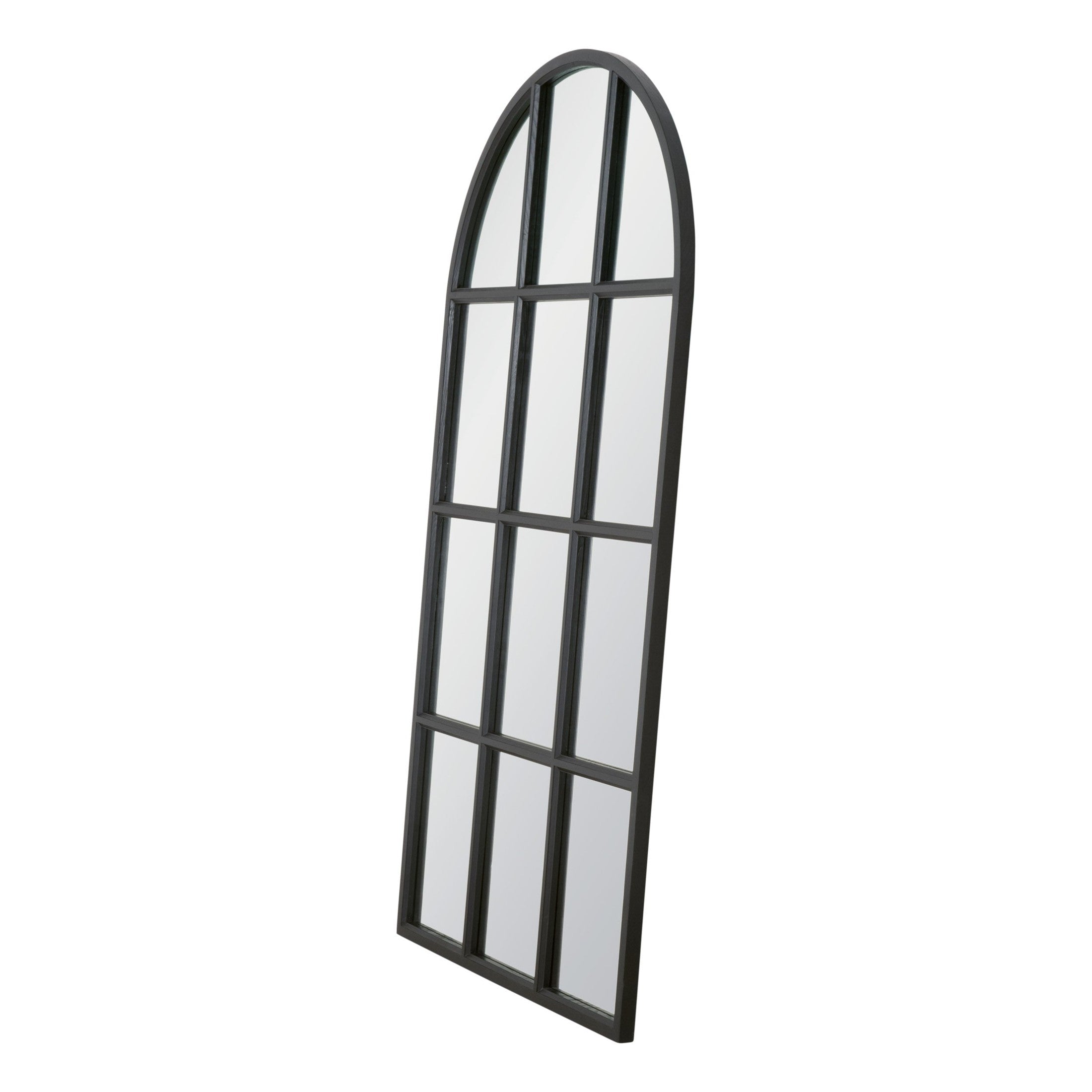 Tall arched mirror with grid design and black frame, perfect for adding light and depth to any room.