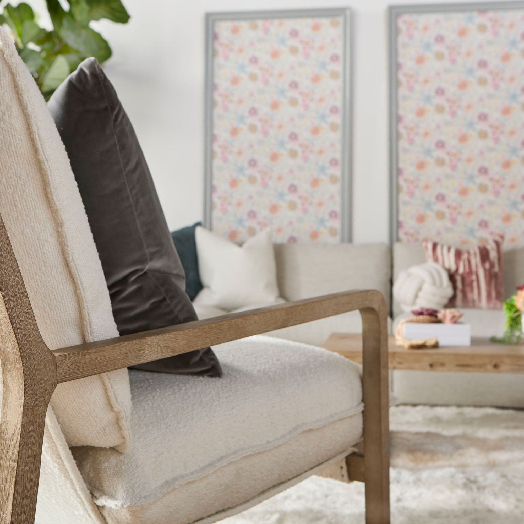 Close-up of the Hamlin Club Chair by Essentials for Living with white boucle fabric and natural gray oak frame.