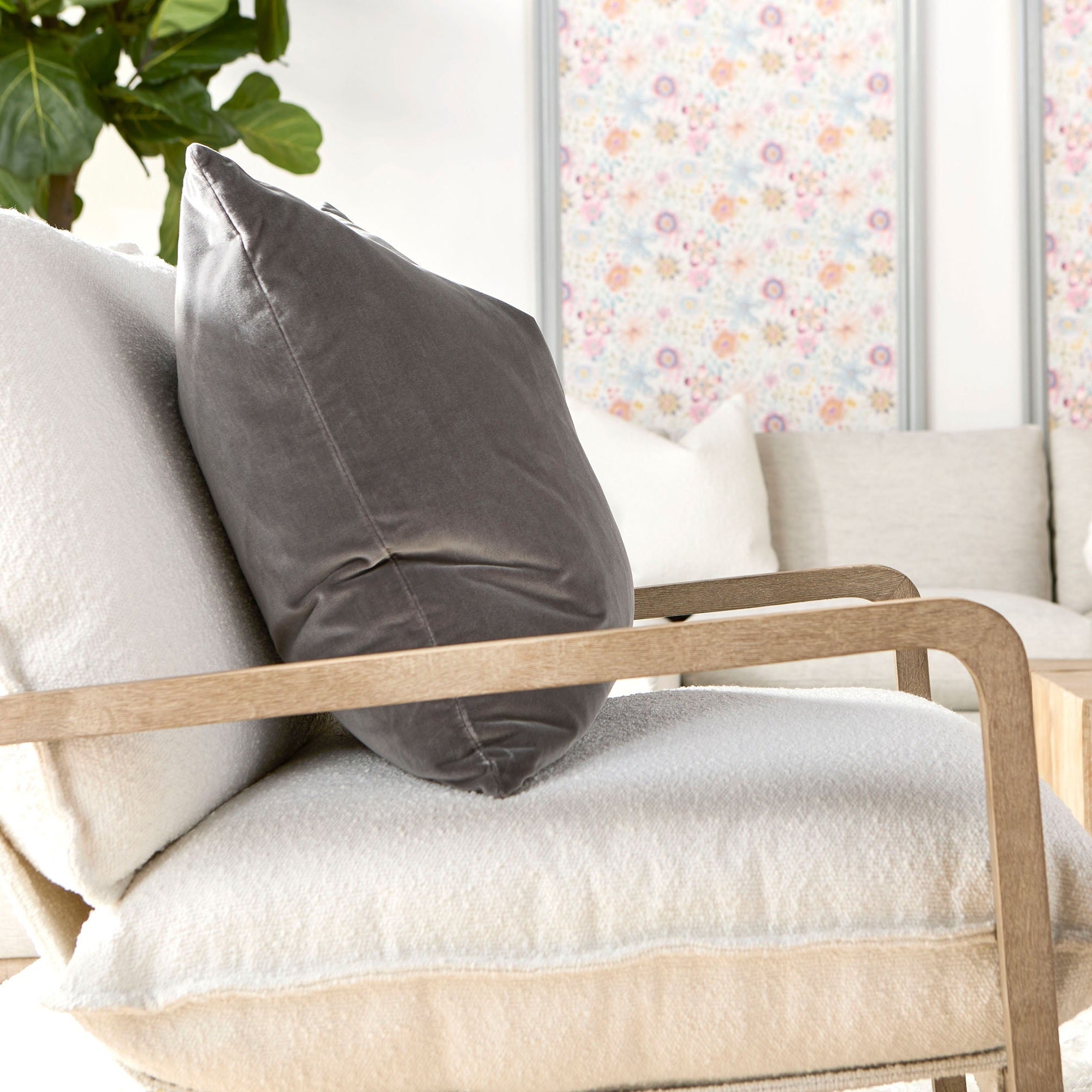 Hamlin Club Chair with white boucle upholstery and natural gray oak sled base in a bright living room setting