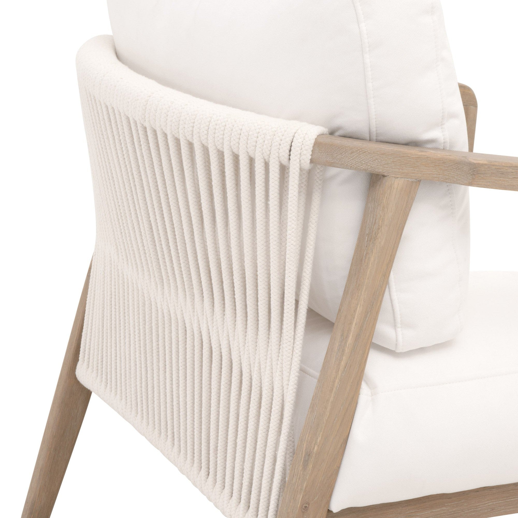 Close-up of Harbor Club Chair showing smoke-gray oak frame and white rope weave with white cushions by Essentials for Living