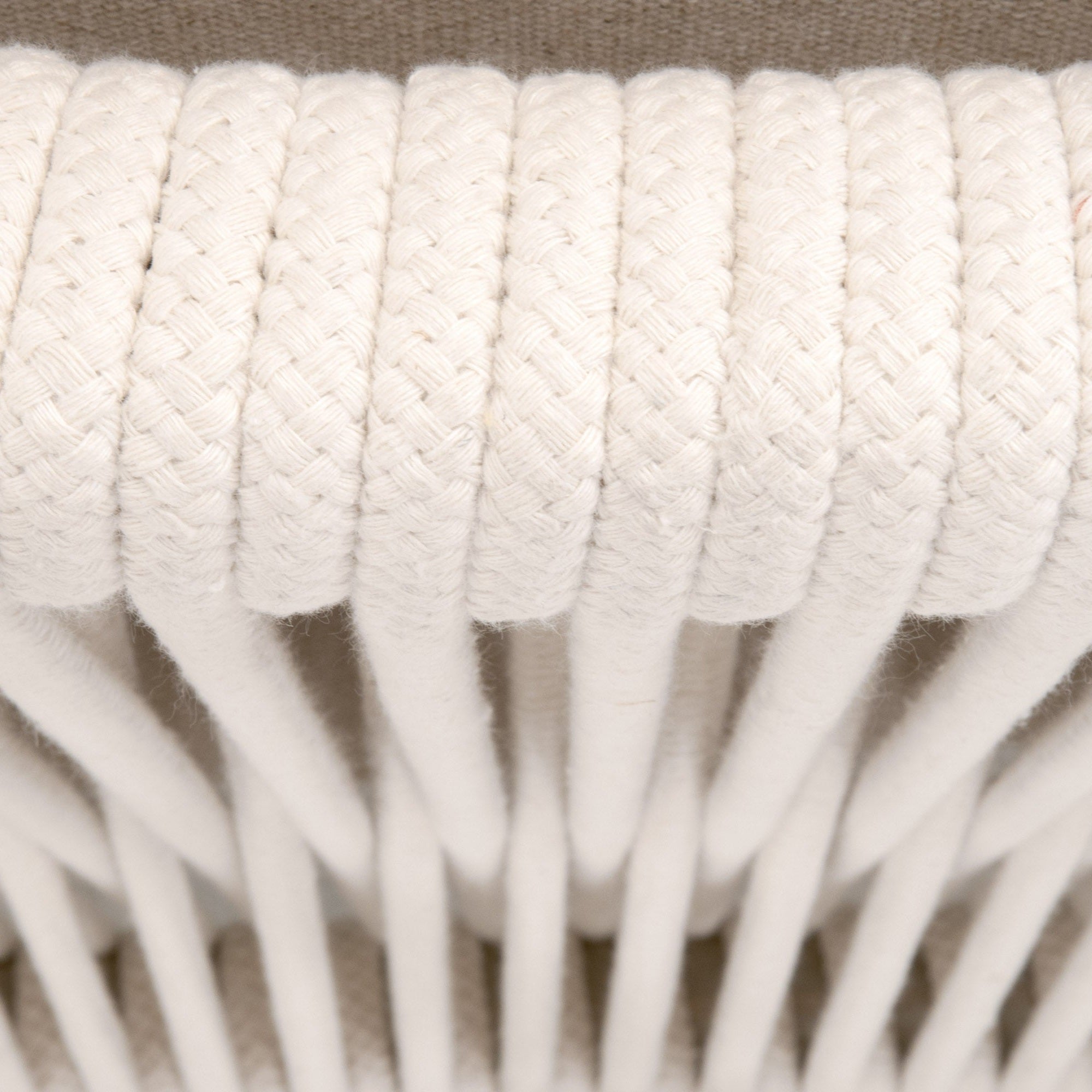 Close-up of white rope weave detail on the Harbor Club Chair by Essentials For Living, highlighting texture and craftsmanship