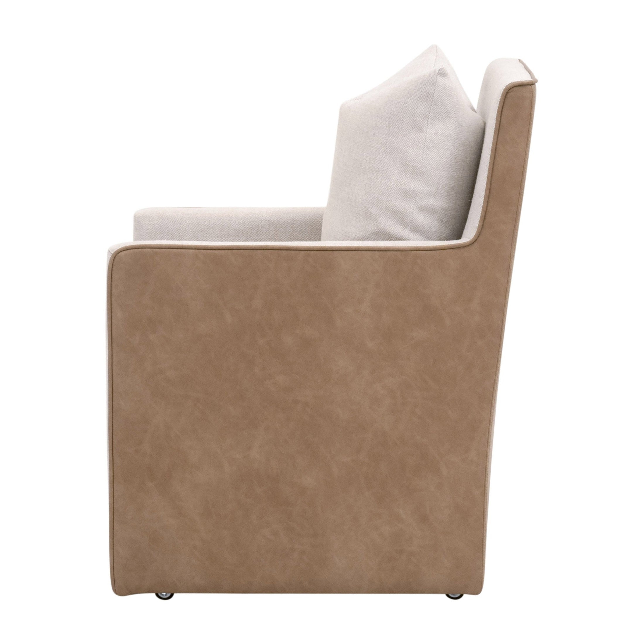 Side view of Harmony Arm Chair with two-tone upholstery and caster wheels by Essentials for Living