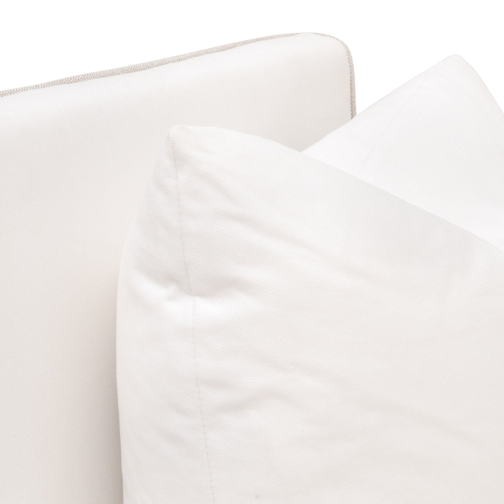 Close-up of white down throw pillow and edge detailing on the Essentials For Living Harmony Arm Chair with Casters