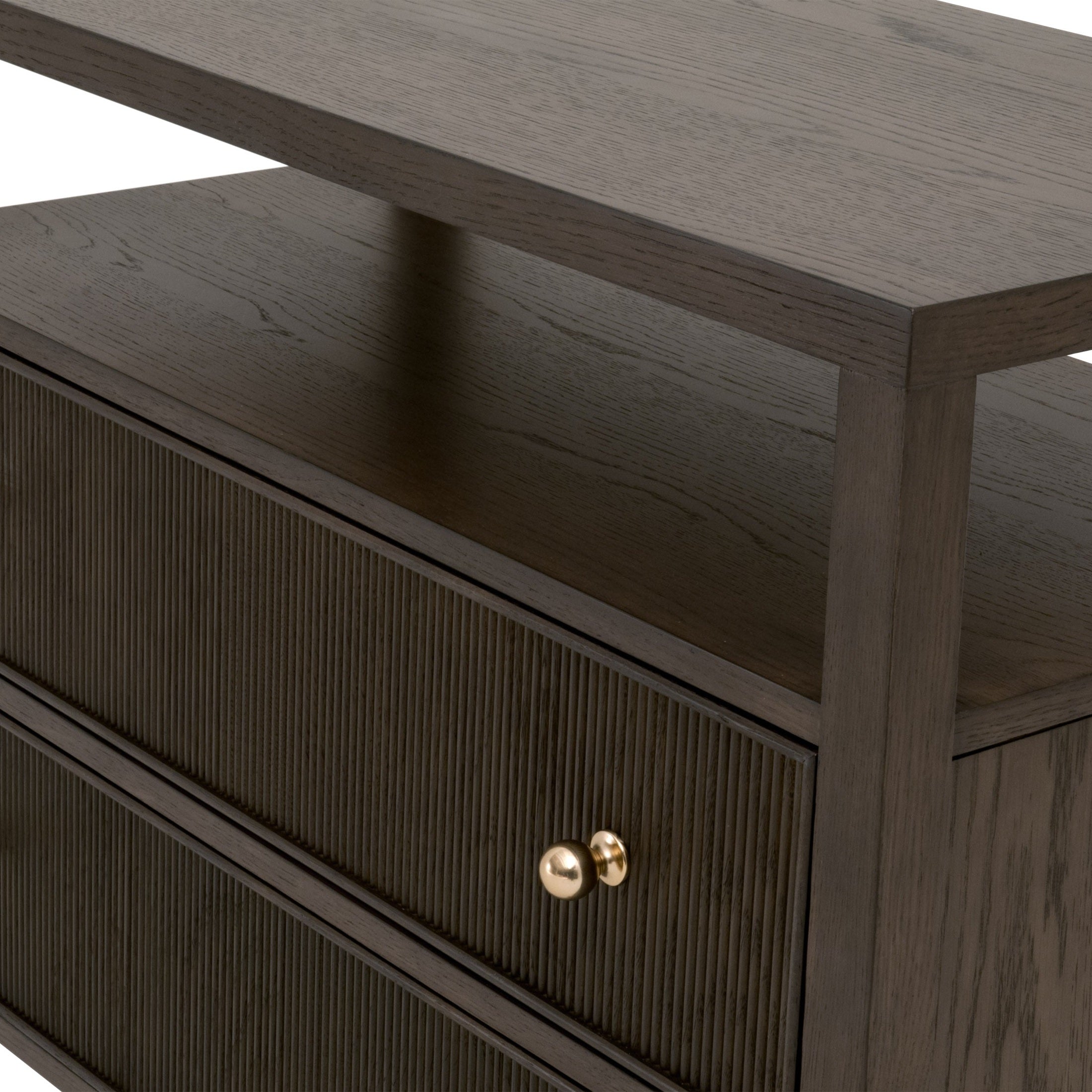 Close-up of Highland Open Shelf Nightstand in Dutch Brown Oak with fluted drawer fronts and brass knobs by Essentials for Living