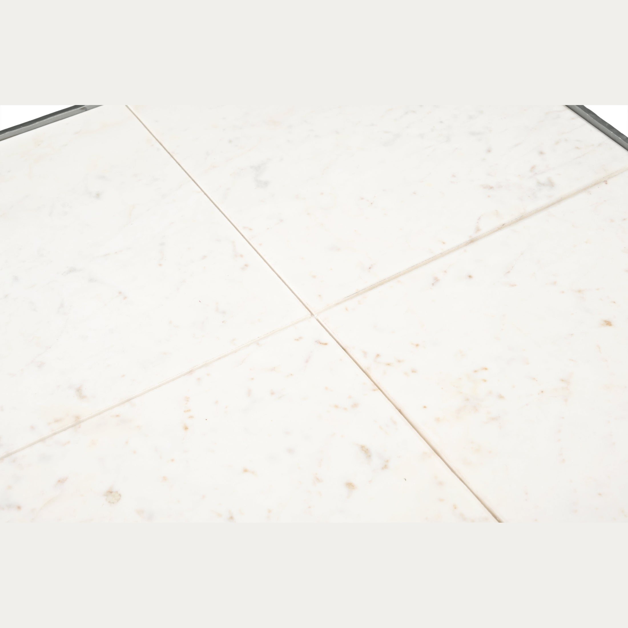 Close-up of natural Baswada marble top with unique veining on Jaden Coffee Table by GO HOME