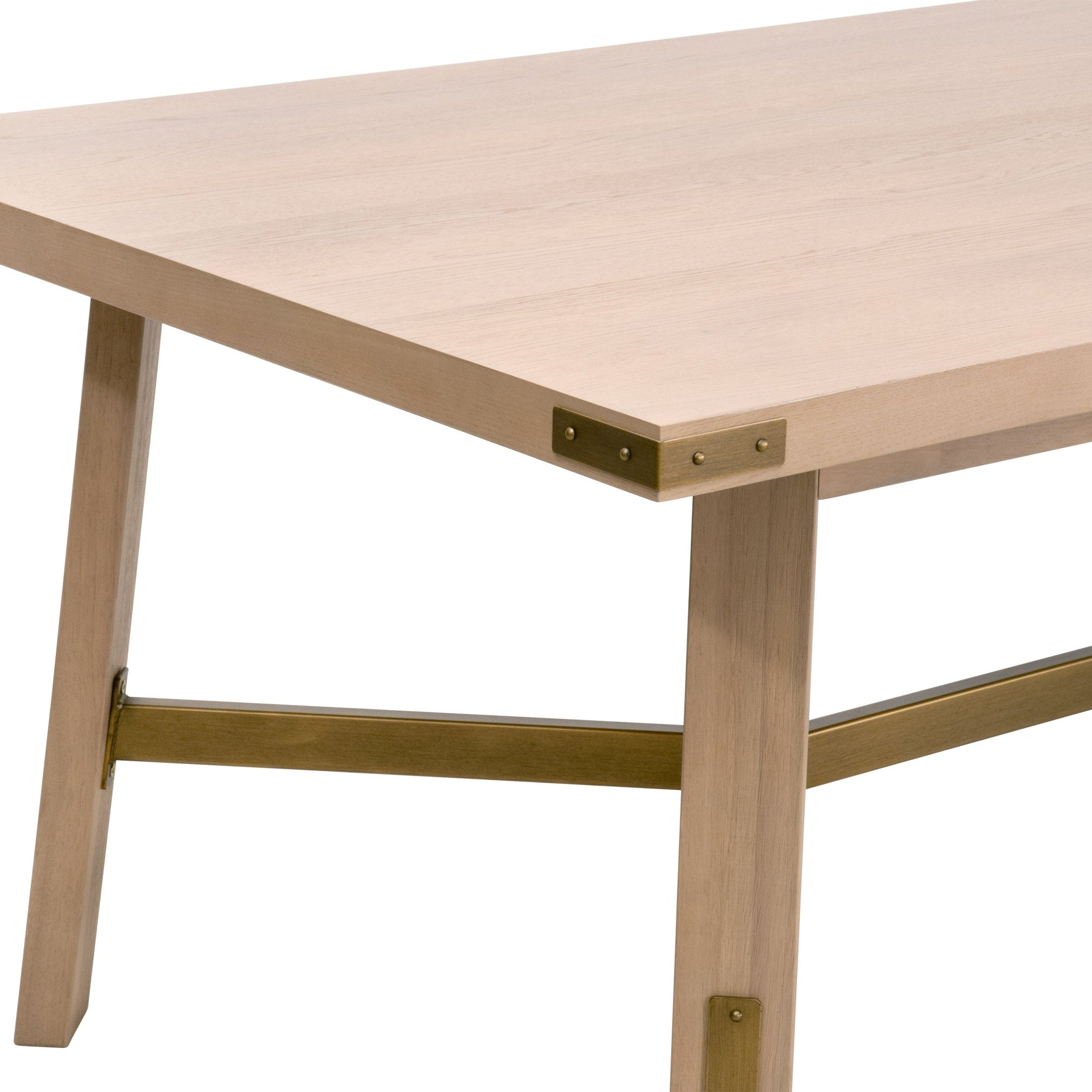 Close-up of Klein Dining Table corner with light honey oak veneer and brushed gold metal base by Essentials for Living
