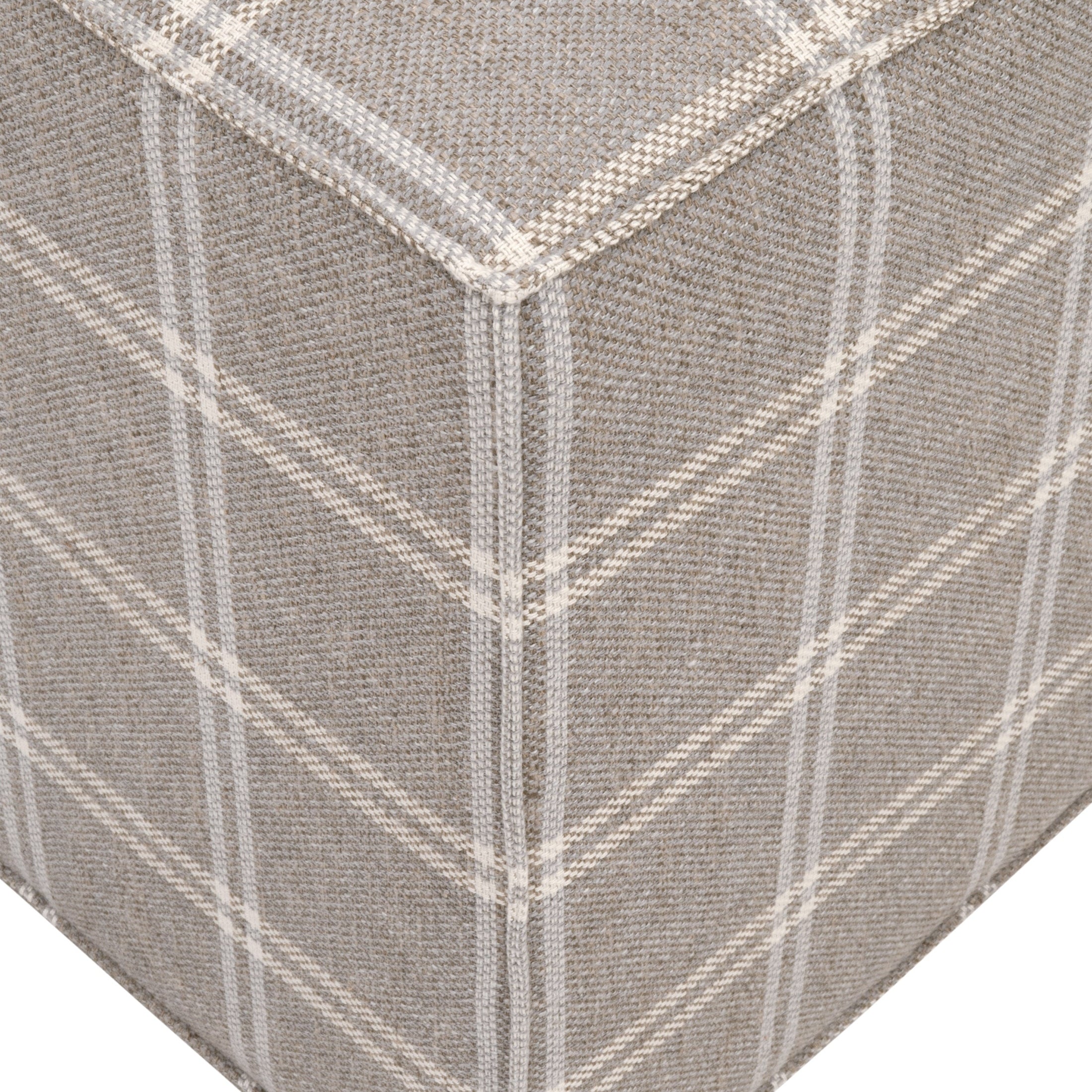 Close-up of Knox Accent Cube upholstered in neutral plaid LiveSmart Walden-Stone fabric with flange edge detail