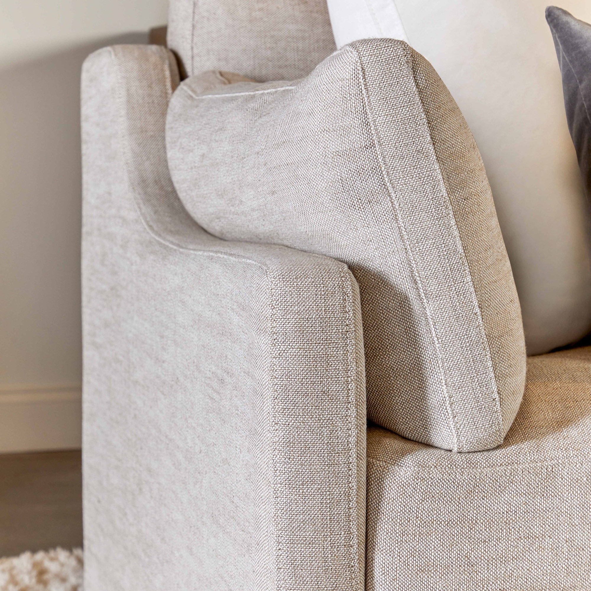 Close-up of light beige linen slipcover on Lena 95" Slope Arm Slipcover Sofa by Essentials for Living