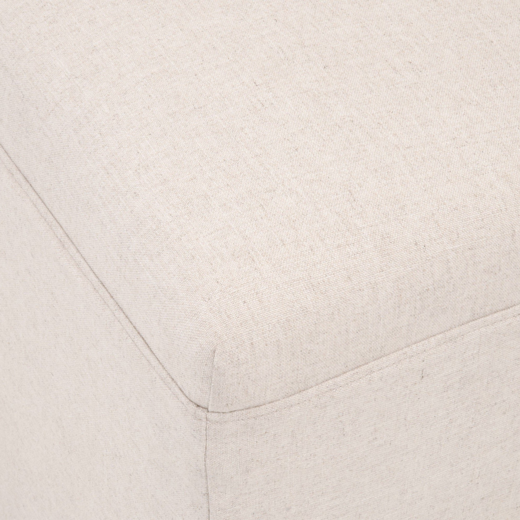 Close-up of the soft neutral Peyton Pearl fabric slipcover on the Levi slipcover dining chair by Essentials For Living