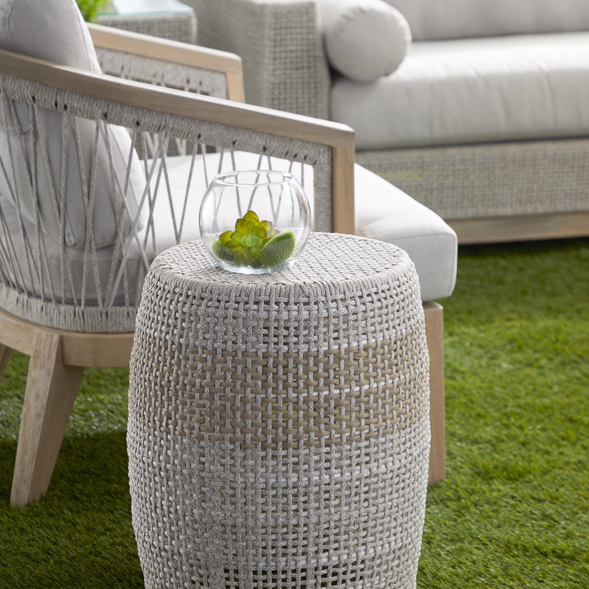 Loom Accent Table with woven taupe and white rope over aluminum frame in outdoor setting by Essentials For Living