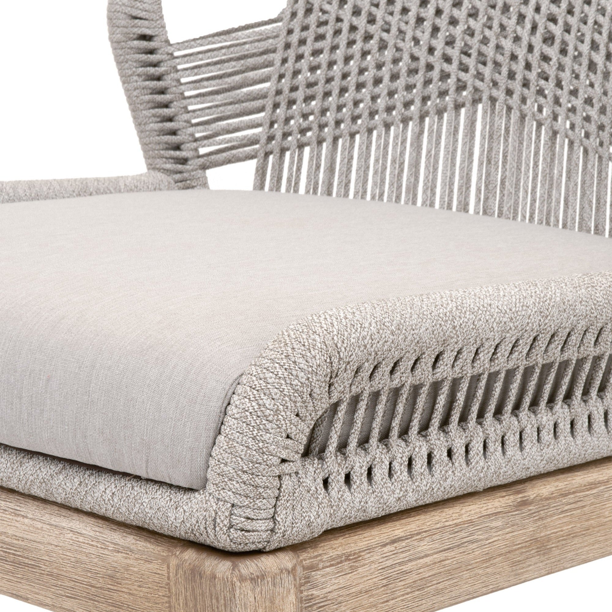 Close-up of Loom Dining Chair seat with pumice fabric cushion and handwoven taupe polypropylene rope on natural gray wood frame