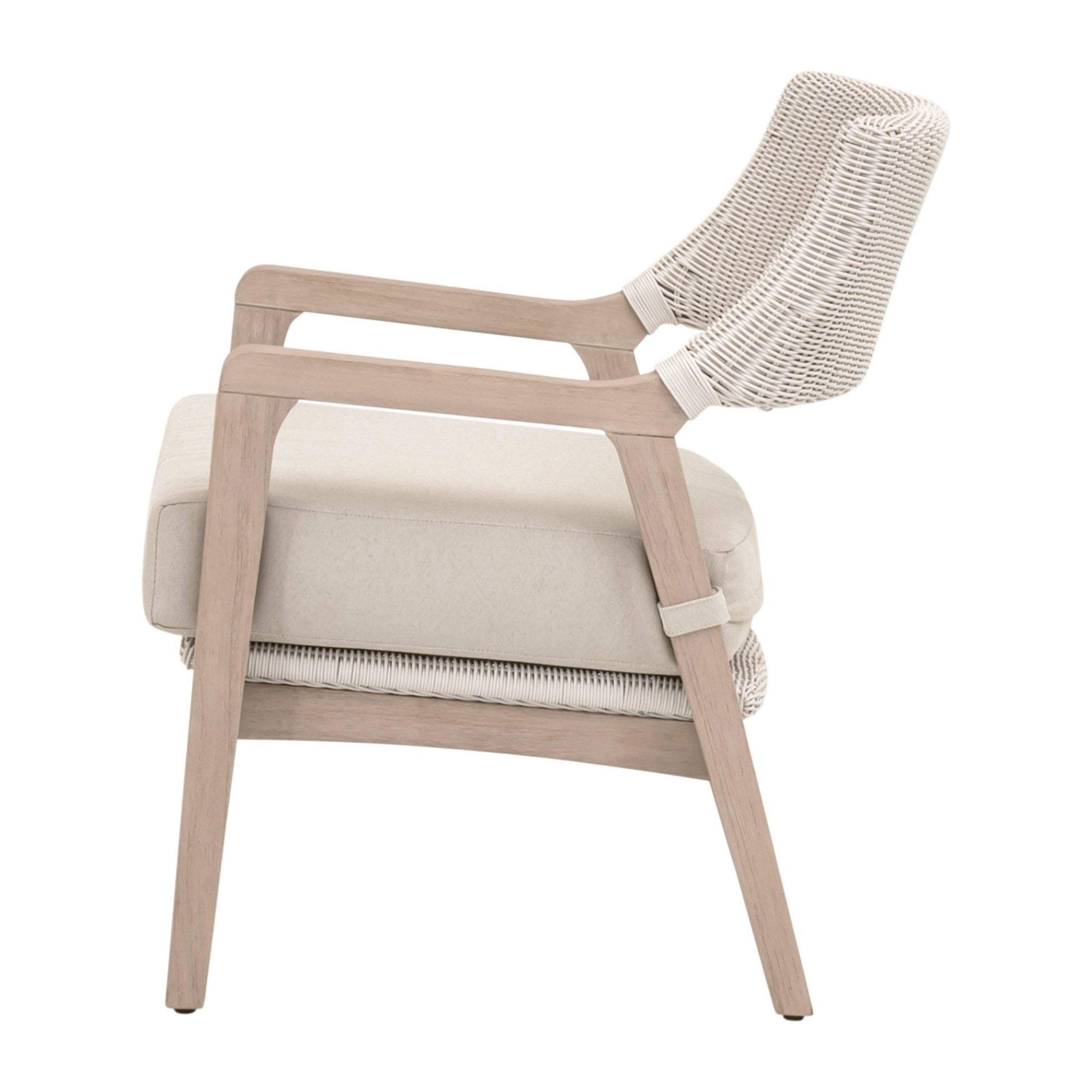 Side view of Lucia Outdoor Club Chair with washed teak frame white wicker and stone cushion by Essentials for Living