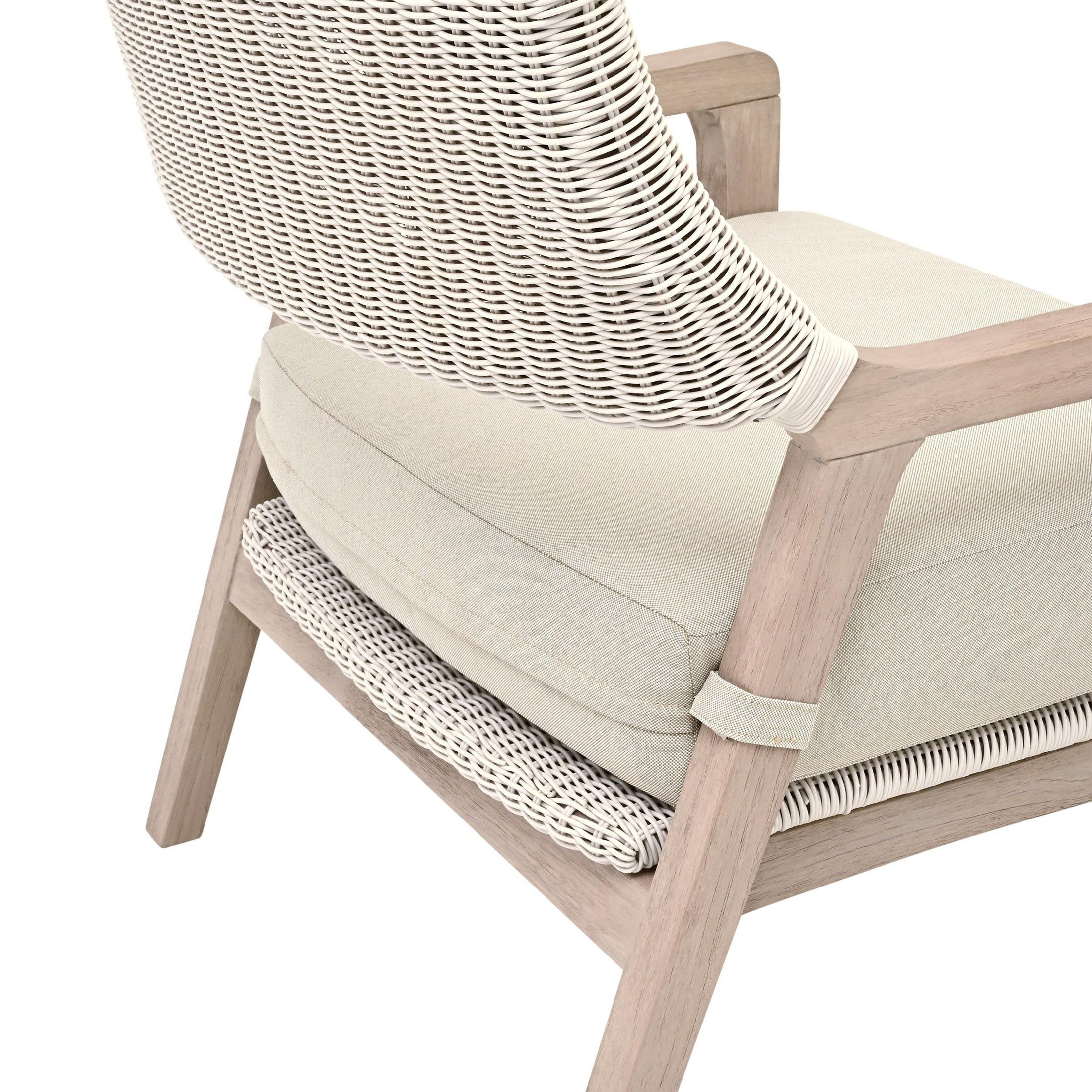 Close-up of Lucia Outdoor Club Chair by Essentials For Living featuring white wicker and stone cushion on teak frame